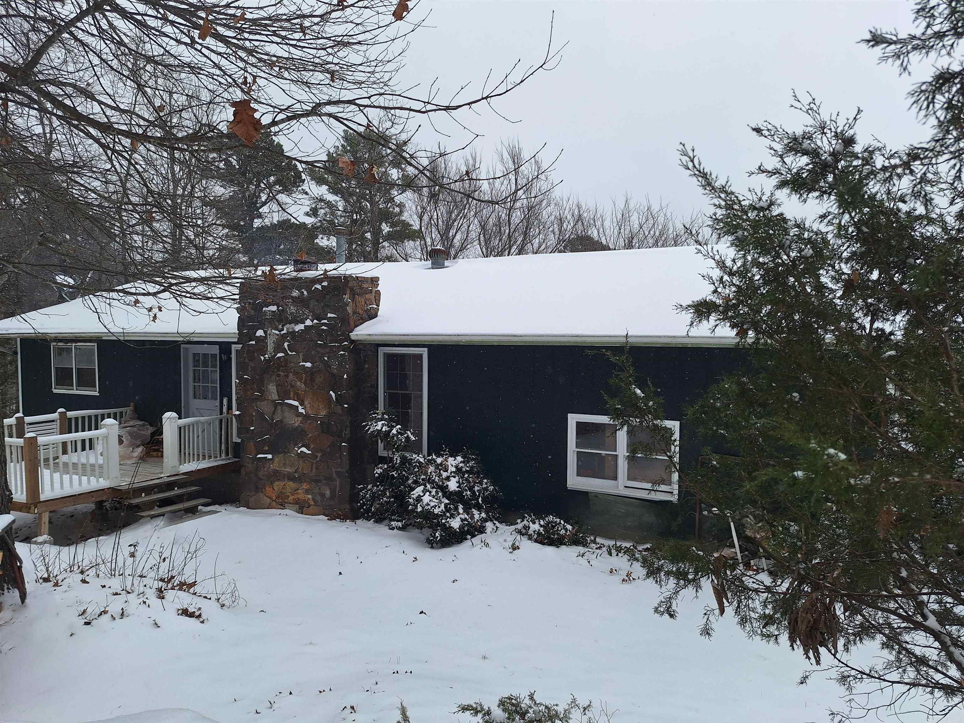 Escape to your own slice of the Ozarks just 3 miles from the Buffalo National River! This property features stunning mountain views, abundant wildlife to enjoy from your porch, and 7.15± acres to roam and explore. Mostly wooded for privacy, the land offers the perfect blend of seclusion and convenience. The home is on city water, with an additional well on the property (needs a new pump). Recent improvements include updated some floor coverings and a brand-new exterior basement entry door. With acreage, views, and location, this one is priced to sell—don’t miss your chance! Present your offer.