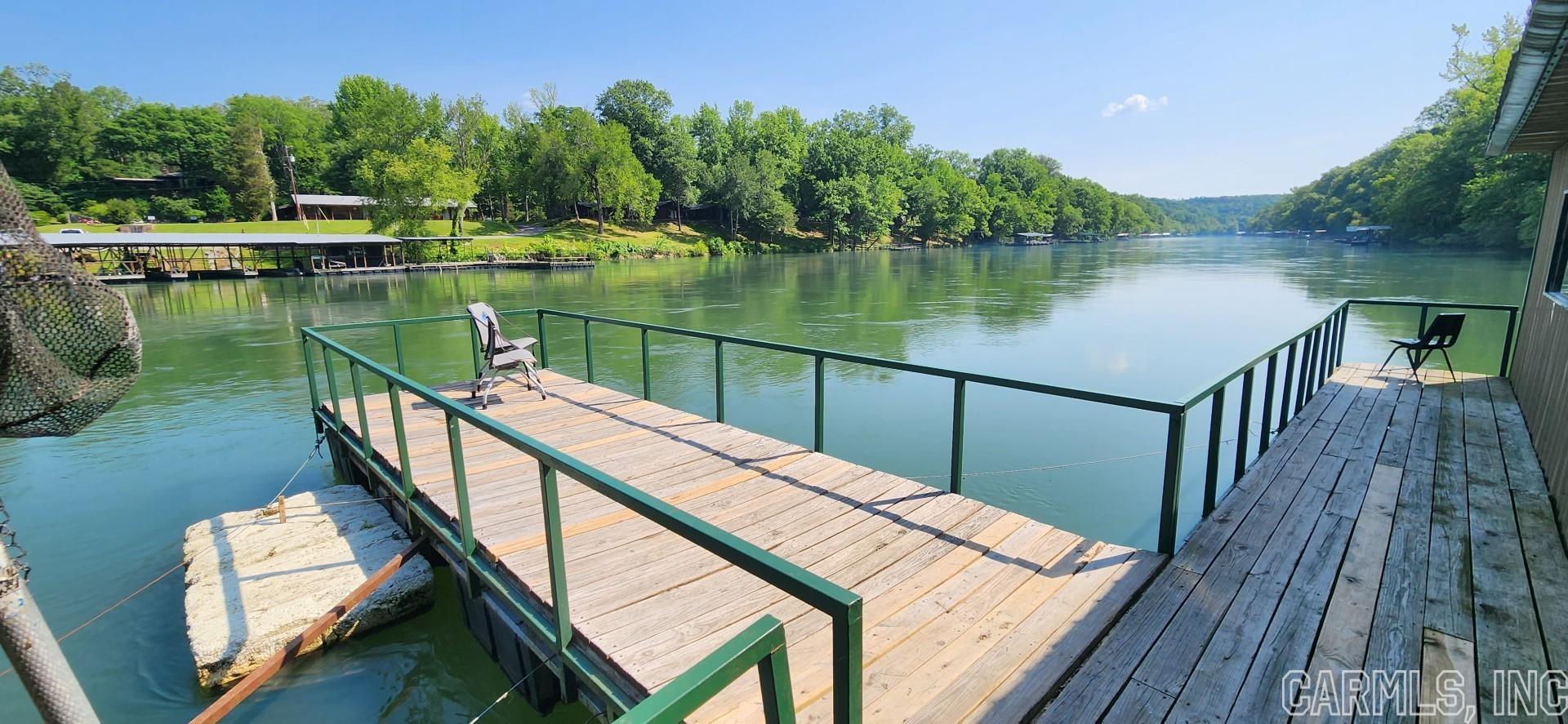 Trout Dock on the Little Red River.  Sold before listed.  4 duplex cabins, 16 camps sites with 50 amp service, trout dock 22 slips, 36 boats and small store.  Includes some property across the street.