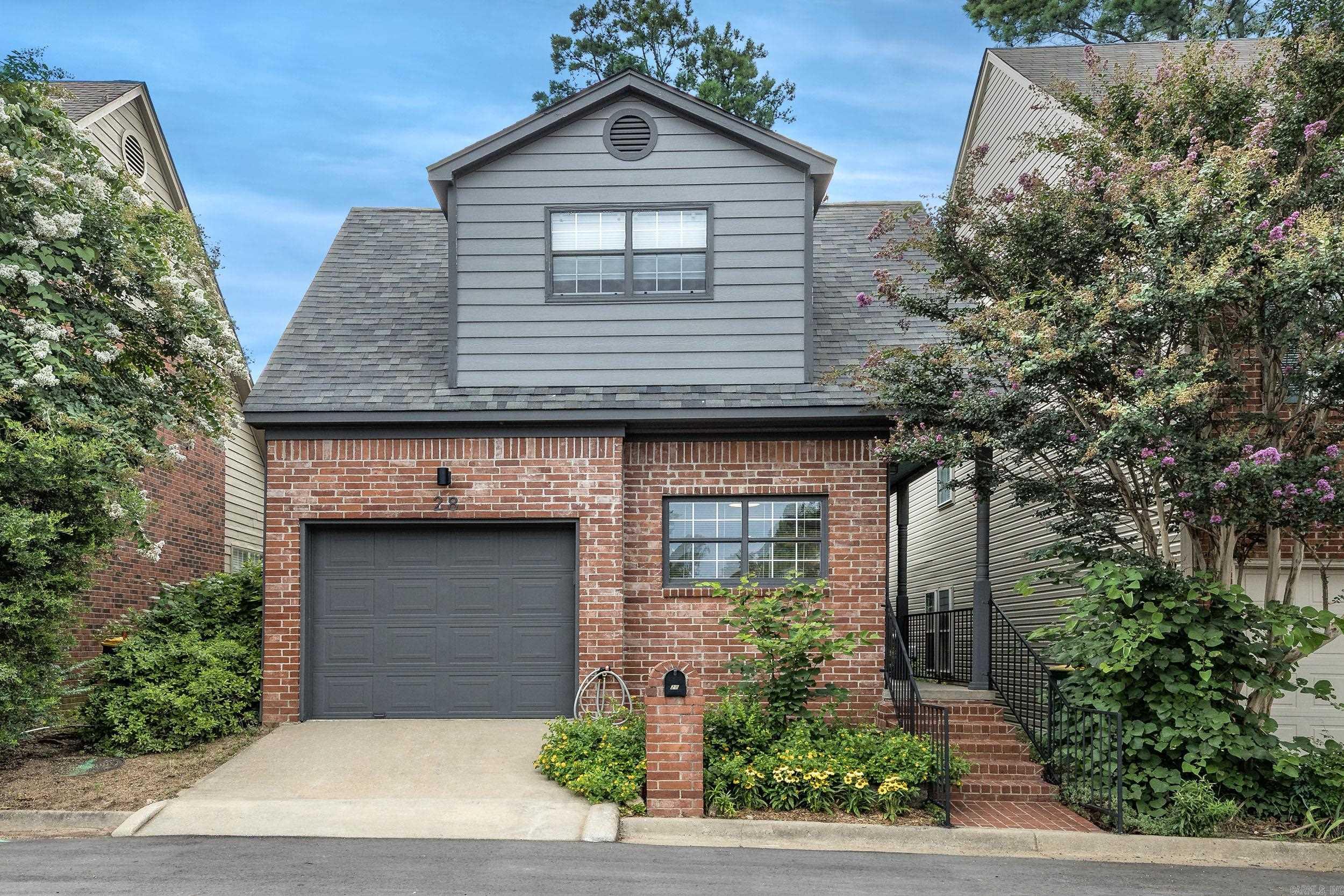 Beautifully updated 3-bedroom, 2-bath patio home in the highly desirable Foxcroft Village. Tucked away in a quiet, established neighborhood, this home offers the perfect blend of comfort, convenience, and low-maintenance living just minutes from premier shopping, dining, and the Little Rock Racquet Club. Step inside to discover 9-foot ceilings, fresh paint, new lighting, new carpet, and a spacious living room centered around a cozy gas-log fireplace. The thoughtfully designed floor plan features a main-level primary suite with hardwood floors, an oversized walk-in closet, and an updated, accessible layout. An ADA-compliant garage ramp provides added flexibility and can easily be removed if desired. Major updates offer peace of mind, including a new roof (2023), a new mini-split unit (July 2026), and a whole-home air purification system for enhanced comfort. With a one-car garage and an unbeatable location close to everything West Little Rock has to offer, this move-in-ready home is ideal for anyone looking to simplify without sacrificing style or convenience. Homes in Foxcroft Village don’t come available often—schedule your private showing today before this gone!