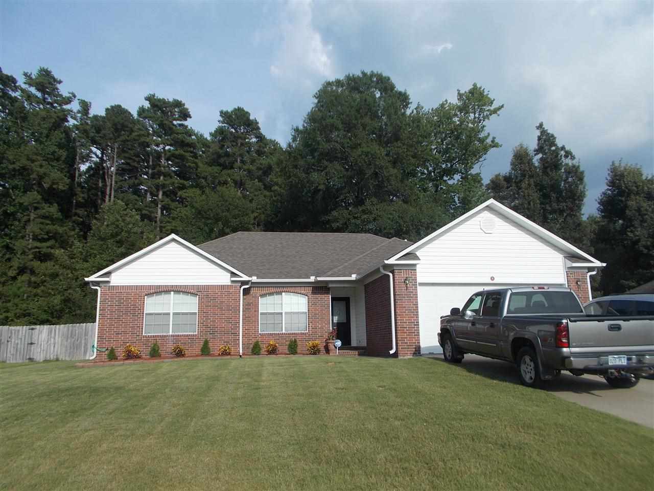 A must see!  You will love the floor plan in this home.  Breakfast and dining room.  Large living room with fireplace.   Three bedrooms.  Master is large with huge bath.  Large walk in closet.  Covered back porch.  Fenced yard and storm shelter.  This home shows very well.  Clean beyond words!