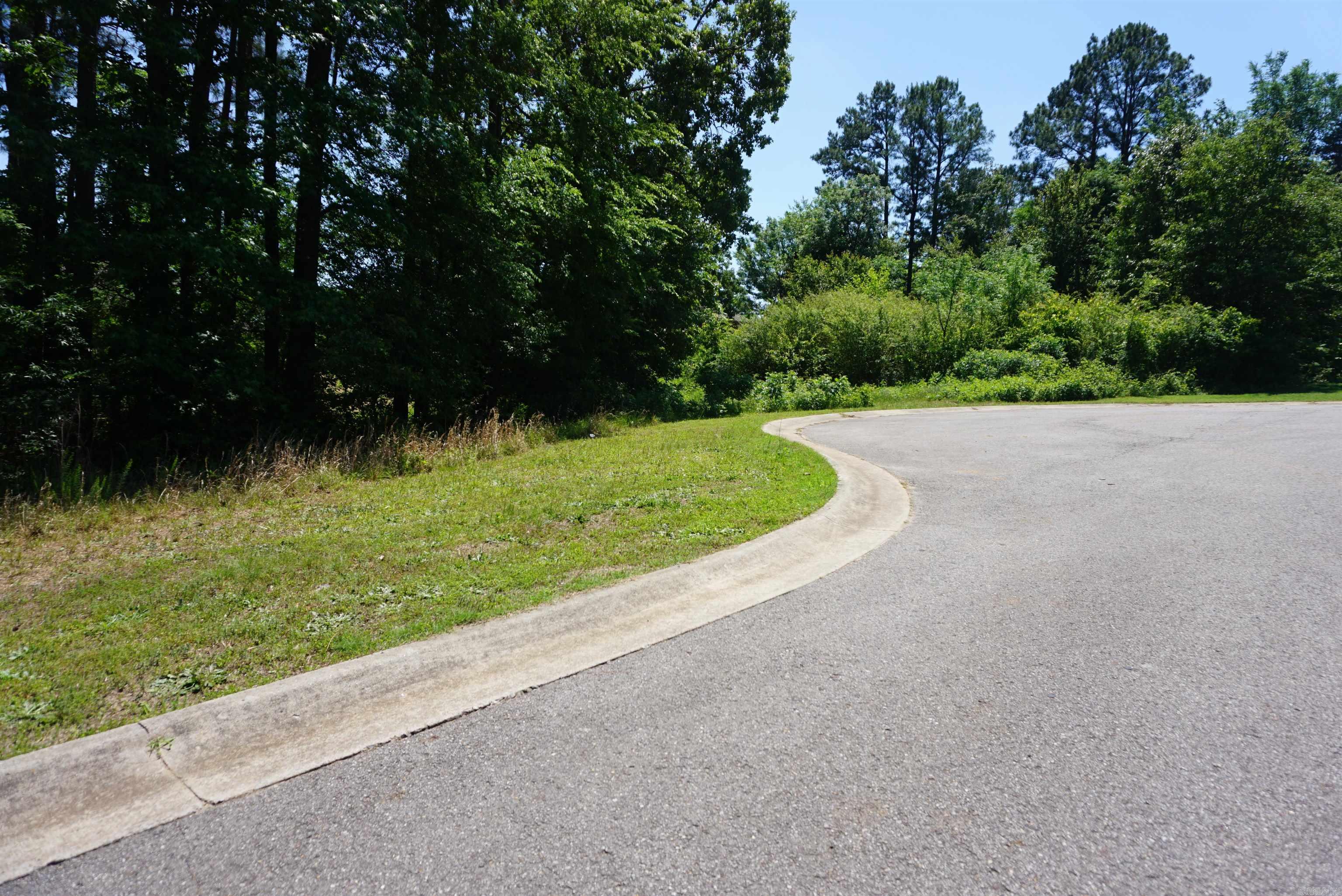 Very nice lot on a beautiful cul-de-sac in Ridgewood Subdivision in West Searcy. Only .3 of a mile from Westside Elementary School and 1 mile to the Searcy Country Club/Golf Course. Beautiful area with very nice homes all around plus new homes being built. One of the prettiest spots in Ridgefield ! Covenants for this lot are available in Agent Docs.