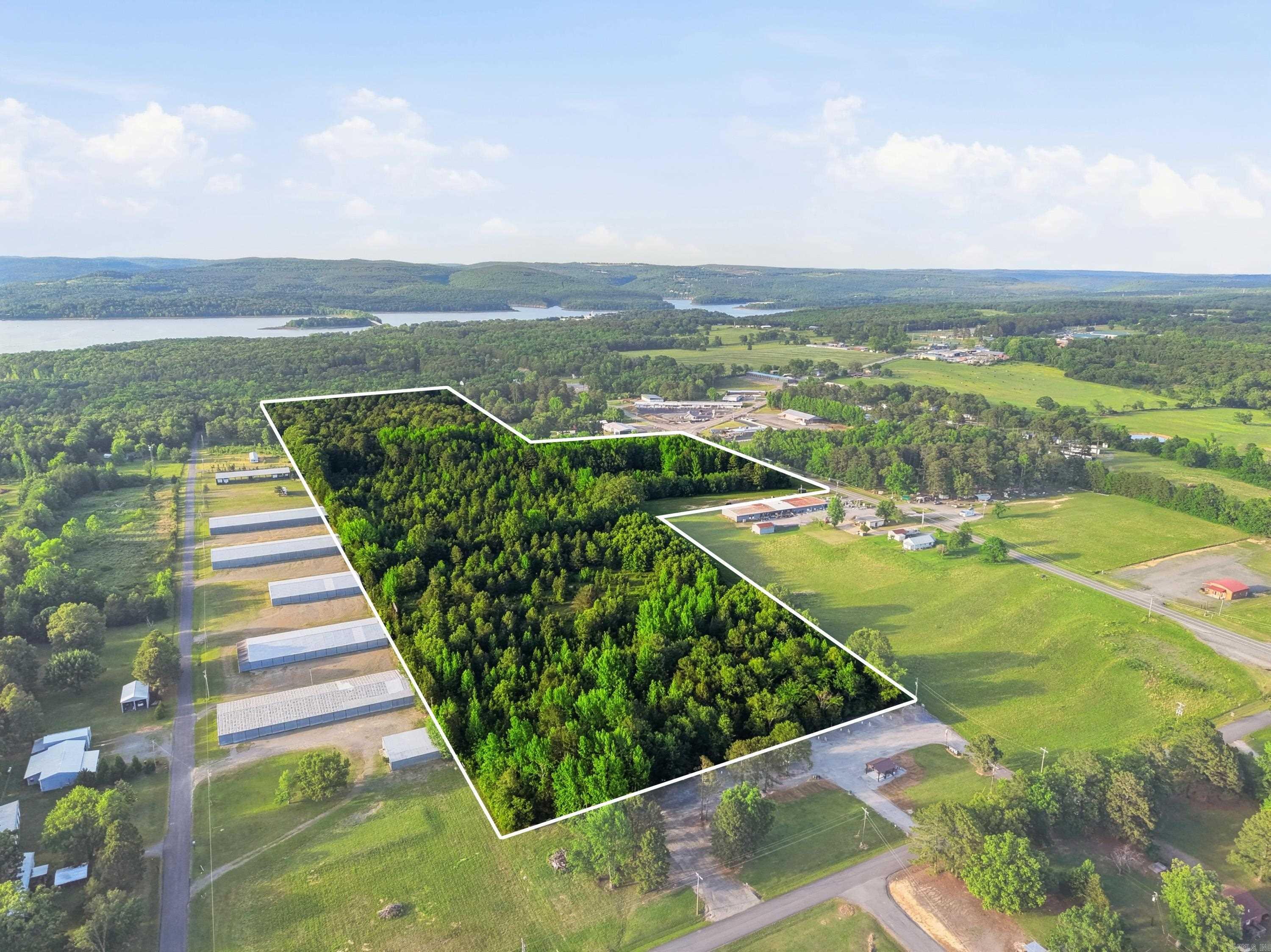Developers Dream.  33.35 acres in the middle of beautiful Greers Ferry Arkansas. Endless possibilities for this unique property.  Would make good building site, for homes or commercial. Boat Launch 3 mins away.  Drive by and give us a call.