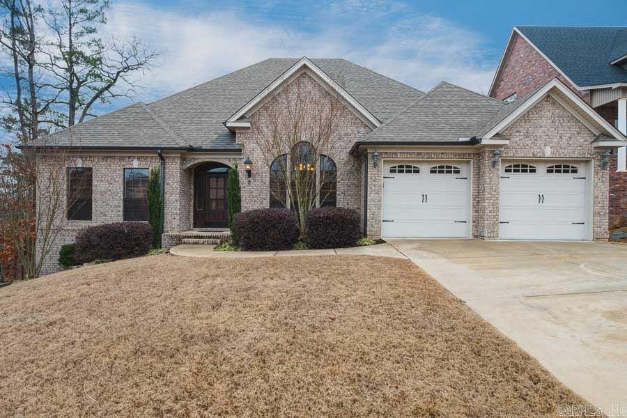 This elegant one level home is located in Epernay subdivision of Chenal. Spacious, one of a kind split floor plan includes 4 bedrooms and 2.5 baths, with vaulted ceilings and extensive crown molding though-out. Custom built kitchen with high end details overlooks the patio and the private large backyard. This home has been meticulously maintained and is a real show piece with many extras. NEW FRENCH DRAINS IN THE BACK YARD ADDED IN MARCH 2017