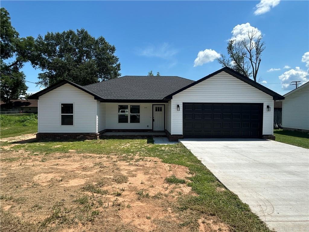 Welcome to this beautiful new construction home, nearly complete and ready for its first owners! Nestled in the heart of Dardanelle, this thoughtfully designed 3-bedroom, 2-bath home offers modern comfort and timeless style on a level lot in a well-established neighborhood. Step inside to discover an open-concept floor plan with quality craftsmanship, spacious living areas, and contemporary finishes throughout. The well-appointed kitchen flows seamlessly into the dining and living spaces, making it perfect for both everyday living and entertaining. The private primary suite features a spacious bedroom, en-suite bath, and ample closet space, while two additional bedrooms provide flexibility for family, guests, or a home office. Enjoy the convenience of a level yard. Located in a desirable, established neighborhood, this home combines the benefits of new construction with the charm and stability of a mature community!