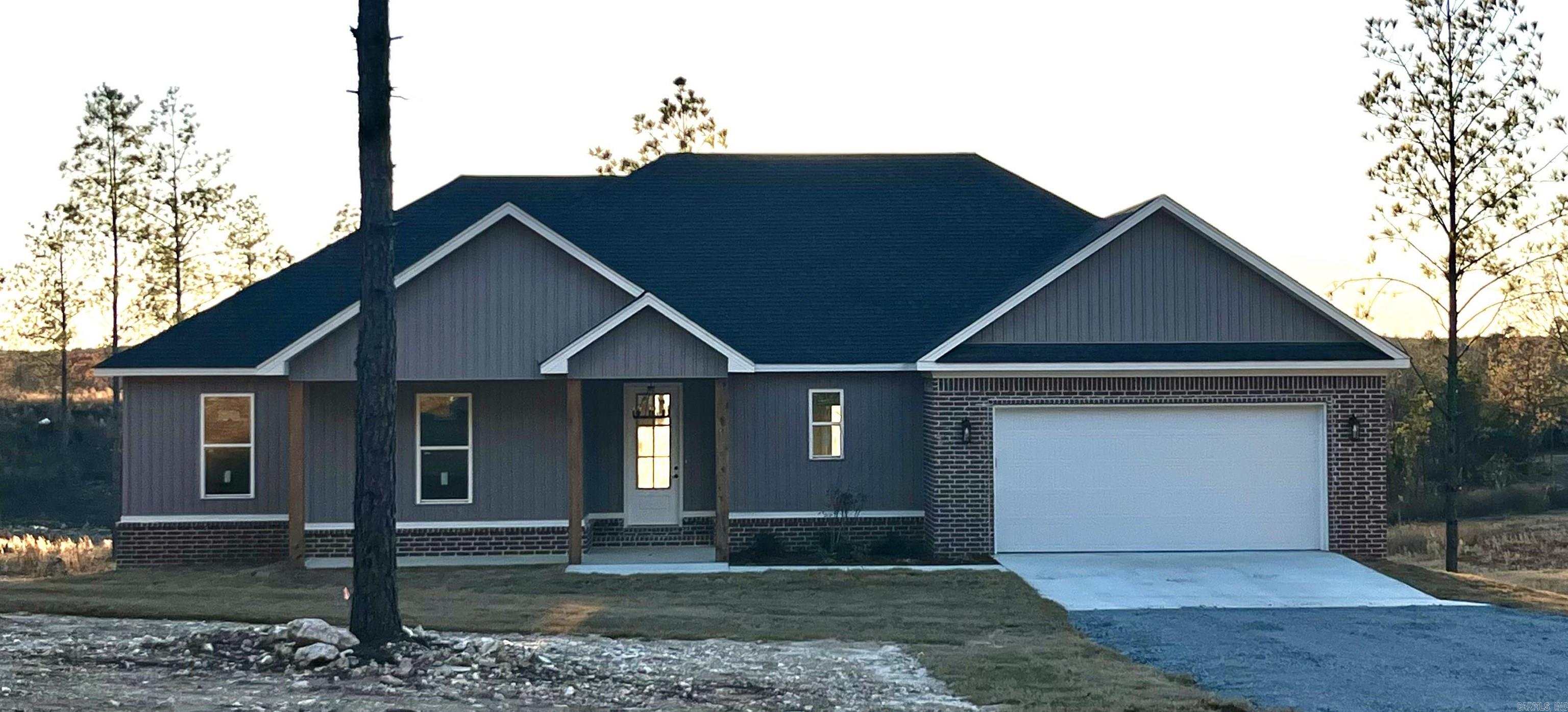 Stuning New Construction home in the country yet close to town! Lots of space and plenty of room. This home is a must see! Open kitchen with large island, custom cabinets, fireplace, large walk in pantry, laundry room connects to the primary closet, large primary suite with large walk in closet & bath. This home has so many custom features! The backyard is beautiful and has lots of space with a deck overlooking it all.