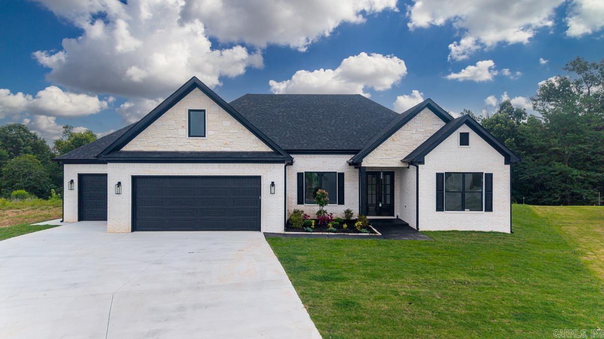 NEW Construction! This spacious 4 bdr/3.5 home is located in one of Maumelle's most popular areas, and it backs up to the Bayou/Wetlands.  That means NO backyard neighbor EVER.  It's on a small cul-de-sac type street and has a HUGE driveway to accommodate guests.  If you love the outdoors the modern firepit on the back patio will be your favorite new hang-out!  And if you own a fishing boat the 32' deep 3rd bay garage will be a perfect fit!  Or you could park golf carts, ATVs, mowers or even tandem park 2 compact cars!   Upstairs is a Bonus room with a closet and a full bath.  So, if you needed a 5th bedroom this could be the dream home you've been searching for! Come see all the other upgraded amenities this home offers.  Schedule a showing today!