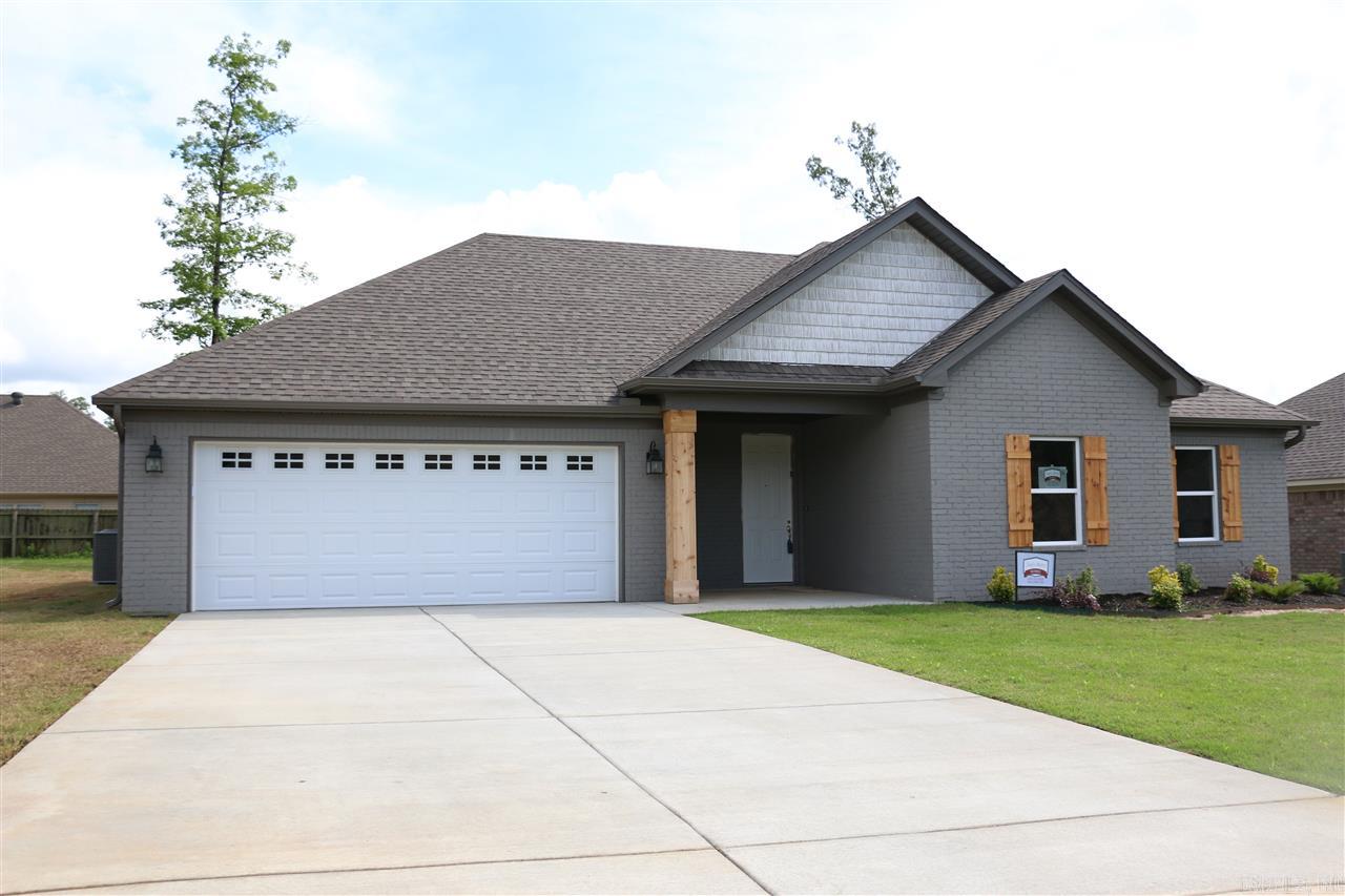 100% brick home, open floor plan, crown molding, huge island in kitchen, granite counter tops throughout, handscraped wood laminate flooring in all main areas. Large custom tile shower in master bathroom, covered back porch.