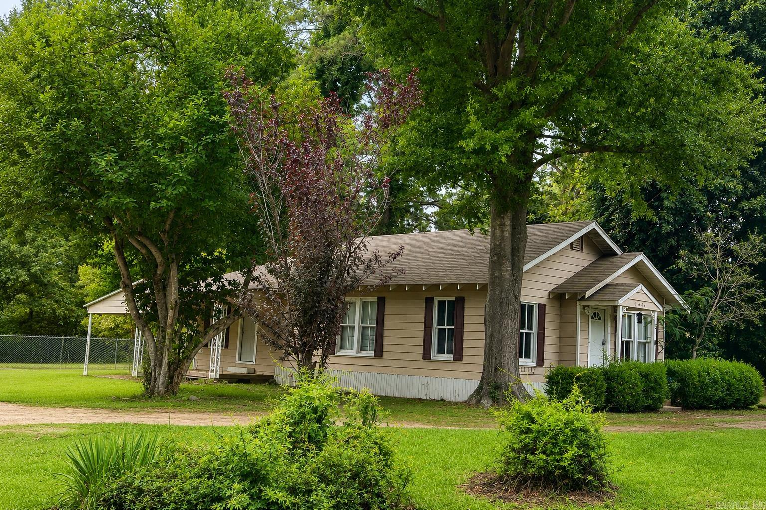 INVESTMENT OPPORTUNITY!  NINE homes, approximately 6 acres, and over 8,231 square feet of income-producing property await! This impressive rental portfolio includes 6 single-family homes and 3 mobile homes, offering a diverse and established investment opportunity.  With a history of consistent occupancy, this portfolio provides the chance to step into long-term financial security and immediate cash-flow potential. Whether you’re looking to expand your existing portfolio or begin your real estate investment journey, opportunities like this don’t come along every day.