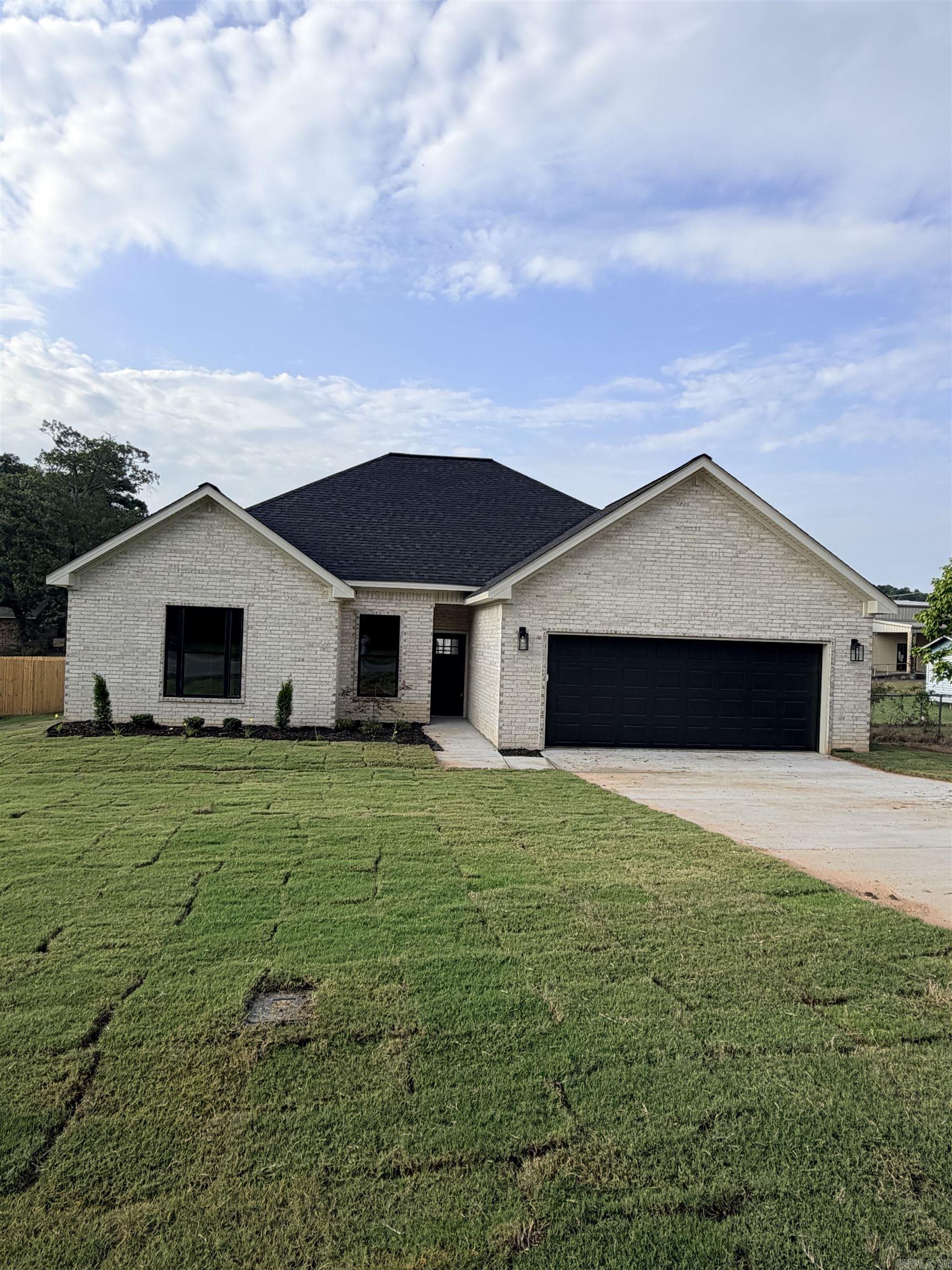 New construction in prime White Hall location!    Don't miss this beautiful new construction home that's nearing competition.  This thoughtful designed home features 3 bedrooms, 2 bathrooms and an open floorplan that's perfect for modern living.  The kitchen offers granite countertops, stainless steel appliances and a large pantry providing style and storage.  The spacious primary suite and comfortable secondary bedrooms make this home ideal for families, professionals or anyone looking for low maintenance living in a growing community.  Additional highlights include a large garage, tile shower and quality finishes throughout.  Upon completion, the yard will be sodded and fenced.
