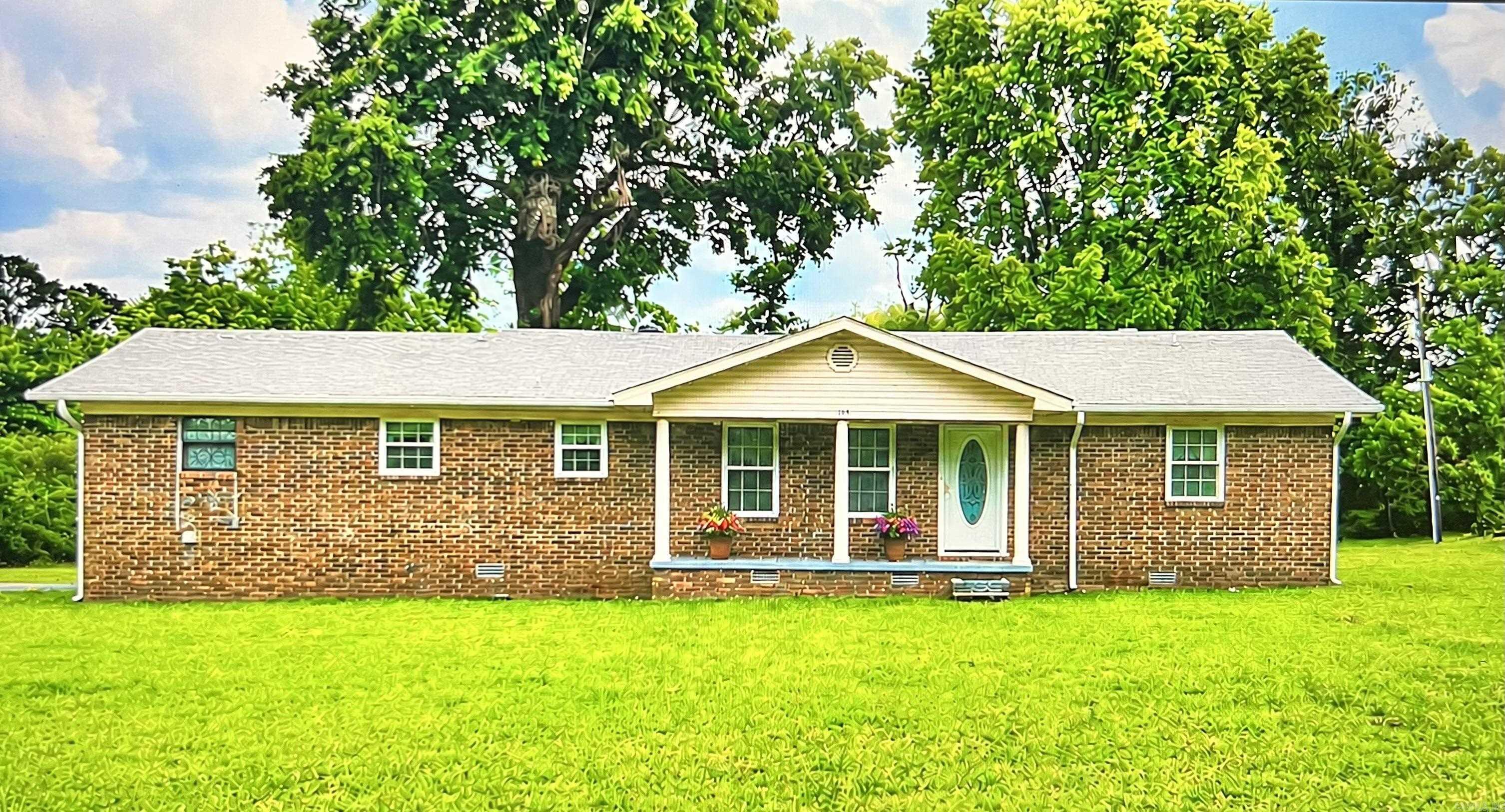 Welcome home to this spacious, open concept kitchen, dining and living area perfect for entertaining guest and hosting family gatherings. This move in ready, all brick home features 2 bedrooms and 1.5 baths and has been very well maintained. This home has charm and character highlighted by beautiful hardwood floors and new windows. The outside offers a large lot and spacious deck. A 10x14 shop with electricity and concrete floor provides storage and workspace for tools or hobbies. Both the roof and HVAC are less than five years old. Schedule your showing today to tour this wonderful home!