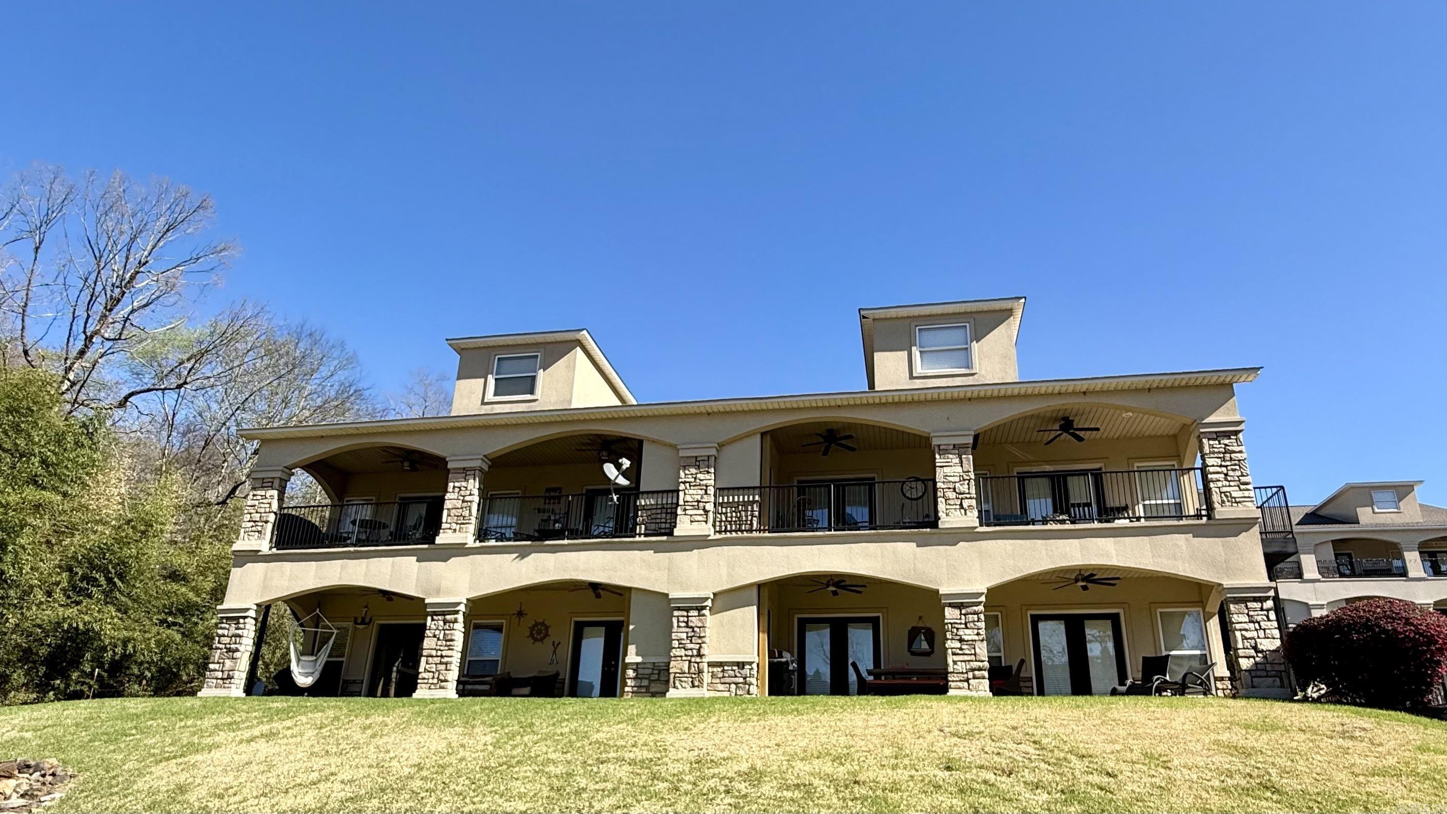 Low-maintenance lake living! Quiet, cozy, light and bright this lovely condo comes fully furnished, simply unpack and unwind. Gated quaint complex, and an end floor unit are sure perks. Enjoy beautiful views of lovely Lake Hamilton from the large living area and wake each morning with views from the master. Whether you are downsizing, looking for your home away from home or your first steppingstone this condo checks all the boxes!