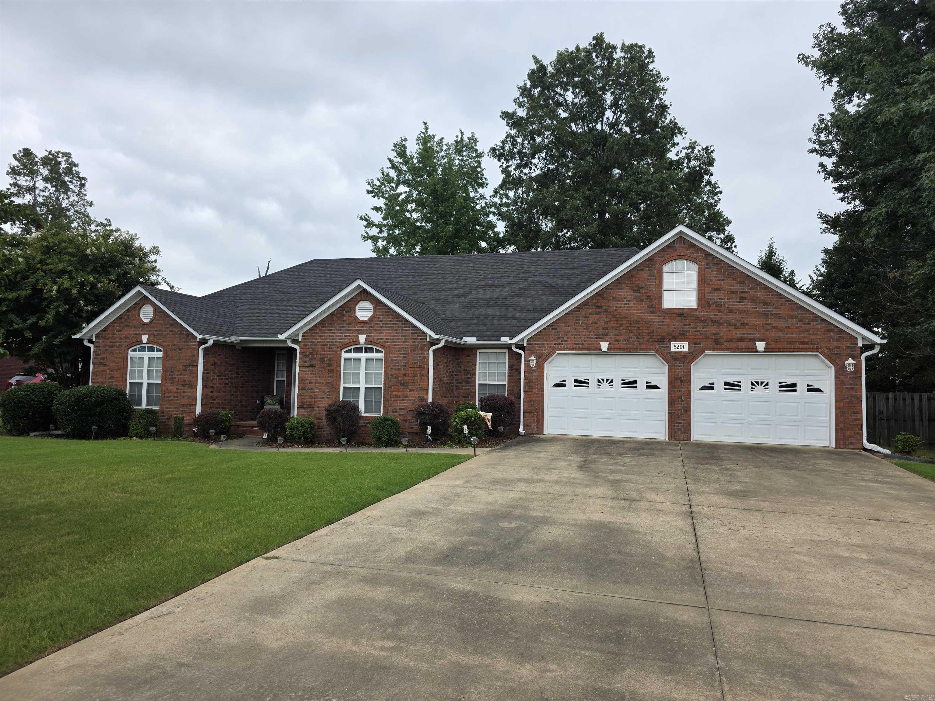 Welcome to this spacious 4-bedroom, 2.5 bath brick ranch-style home or use it as a 3 Bedroom 2.5 baths and a Bonus room. in the desirable Carriage Hills Sub.  With 2,167 sq. ft. of well-designed living space.  In addition to the eat in kitchen it also has a breakfast Bar and a Formal Dining room.   Sitting on a generous 116x185 lot, the property boasts a wood privacy-fenced backyard, a screened-in porch and a large shop, ideal for hobbies, storage and workspace. Inside, enjoy the comfort of a large living room and walk-on closets in every bedroom. Just a half mile from Greene County Tech High School, this home offers both convenience and charm in a quiet neighborhood setting.  Added Bonus, Big Screen TV and Refrigerator Convey with an acceptable offer.