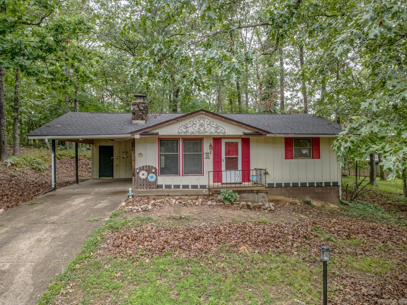 Welcome to beautiful Cherokee Village! Nestled on a quiet lot, 1 Hondo Circle offers the perfect blend of comfort, charm, and small-town lake community living. This newly remodeled, inviting home features a spacious layout with plenty of natural light, making every room feel warm and welcoming.  Enjoy peaceful mornings on the porch, mature trees for added privacy, and easy access to the area’s golf courses, lakes, walking trails, and recreation opportunities. Whether you’re searching for a full-time residence, weekend getaway, or investment property, this home is full of potential in one of North Arkansas’ most scenic communities.  New roof added in 2022. new hot water heater and furnace added in 2022, New Hvac system added in 2023 and new vinyl plank flooring added in 2024. This in an inherited property and is sold as is. Don’t miss your chance to enjoy the relaxed lifestyle that Cherokee Village is known for!