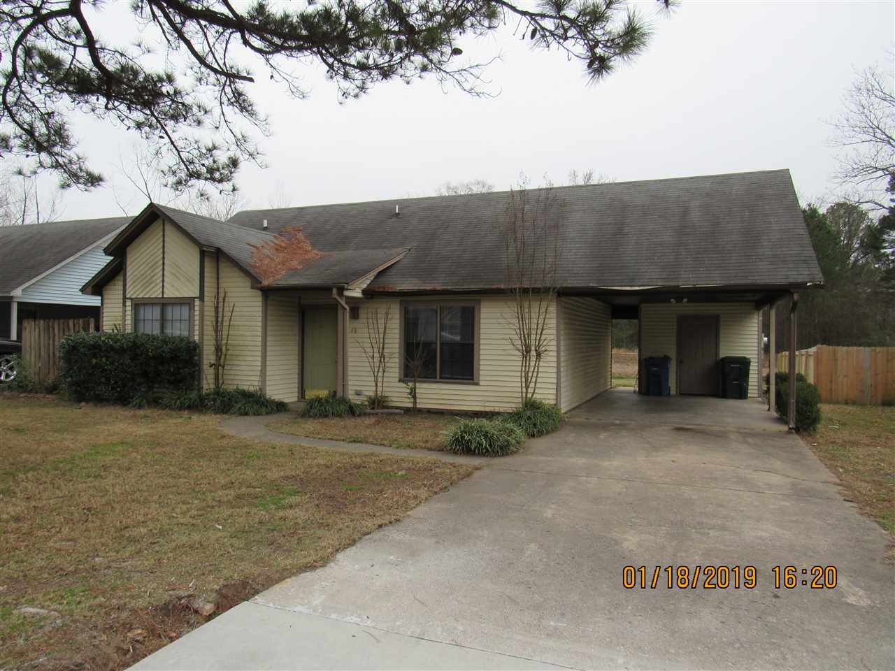 Spacious 2 bedroom home, large family room with vaulted ceiling & laminate floors, large eat in kitchen with all kitchen appliances including refrigerator, laminate floors in the bedrooms, large walk-in closet in the master, 1 car carport with storage room, chain link fenced yard.
