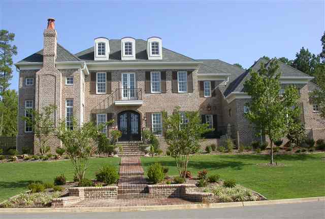 Southern Living Idea Home located Premier gated Red Oak Ridge w/pool, private lakes, paved walking paths!l Elegant  4 BR's, 5.5 BA's w/ Master, office, large open family area w/FP open to Gourmet kitchen w/ adjoining eating area. Wine  closet & Formal Dining all on main level .3 BRs, game room, home theater room w/ full bar,computer loft.Incredible Landscaping /open air kitchen & outside fireplace  2 covered porches on upper level! Beautifully furnished-not covered in Listing price. 1 YR builder's Warranty.