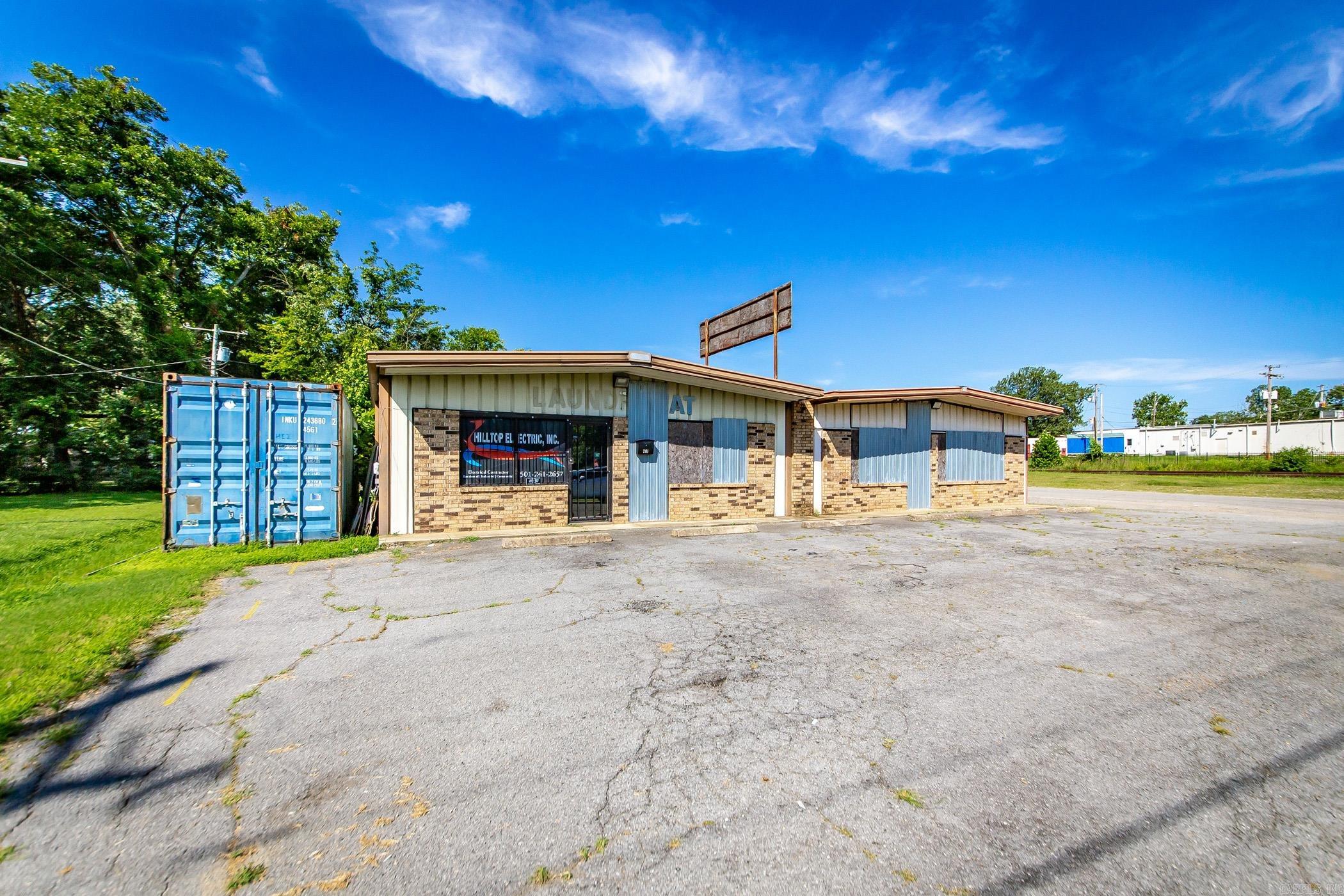 Turnkey Commercial Opportunity: Established Electrical Co. Location - Zoned C2! This 3,300 sq ft commercial property, strategically zoned C2 (Quite Commercial), presents an outstanding opportunity for your business! Currently home to a successful electrical company for over 18 years, this turnkey space is perfectly set up for continued operations or adaptable to a wide range of other commercial ventures.  The building features a highly functional layout designed for efficiency, including three dedicated offices, a convenient kitchen area, a clean bathroom, and a generous warehouse space with a large roll-up door for easy access. You'll also benefit from a brand-new HVAC system, installed in 2024, ensuring comfort and energy efficiency.  For those looking for a seamless transition, the existing electrical inventory and equipment are also available for sale with reasonable offers.  Don't miss out on this prime commercial property, offering a proven location and an ideal setup for your next chapter! Square footage is approximate; measuring is encouraged.