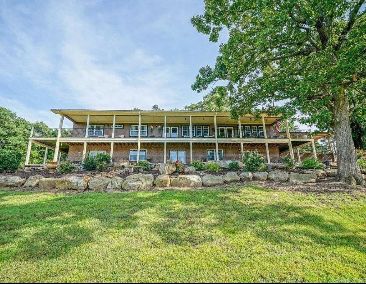 Hidden behind an iron gate, this 93± acre luxury estate offers 5,328± sq. ft. living w/6 bed/4 bath. Mostly furnished, this updated 1966-built home blends craftsmanship w/ modern elegance. Open kitchen & dining area feature granite countertops, a chef’s gas stove, the grand living room w/ bronze-tiled ceiling, & electric fireplace. The walk-out lower level is the ultimate entertaining space w/ brick flooring, full kitchen, fireplace, & French doors to a brick patio. The main-level wrap-around deck, enjoy views of Danville & the mountains. Outdoor living w/ a outdoor kitchen, stocked pond, hiking & ATV trails, and 9-hole frisbee course. A 2 story barn w/ guest quarters, detached garage, w/ 550± sq. ft. wine room complete this paradise. The vineyard is ready to be replanted, offering income opportunities as hunting club, short-term rental, luxury event venue. ** 1 year paid membership to Chamberlyne Golf course only 12 min away.
