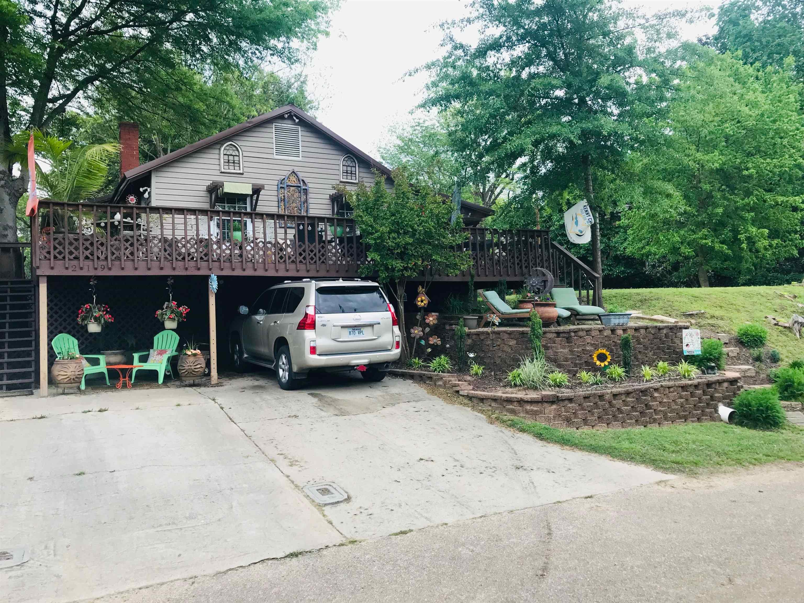 219 S 1st St in Augusta is a uniquely charming property offering stunning RIVER VIEWS from the front deck and a secluded private oasis in the fenced back yard. The seller has taken care to upgrade and maintain the property with 2017 renovations including new central heat and air, durable and pet-friendly bamboo flooring, and whole-home security system. A new metal roof was added in 2020 as well. The beautifully landscaped back yard features a wooden pergola and cozy seating area perfect for hosting friends and family, providing a phenomenal space to enjoy all types of outdoor entertaining. In addition to their striking architectural detail, gorgeous coffered ceilings supply distinctive touches of warmth and character throughout the interior of this one-of-a-kind home. An efficient stackable washer/dryer is conveniently housed in the spacious full bath and will convey along with all kitchen appliances (all purchased in 2017).