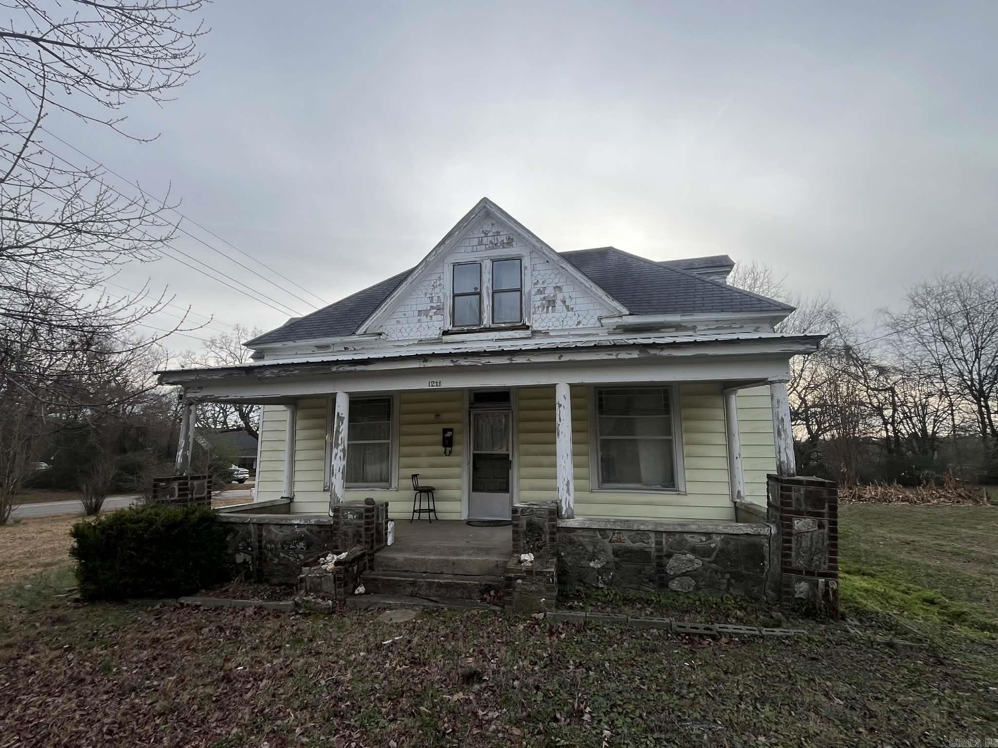 Charming Fixer Upper on a large corner lot. Roll up your sleeves and bring this historic home back to its full potential! Fine details throughout, 5 BEDROOMS, and a PRIME in-town location, with some TLC this house could be restored into a truly beautiful home!  Walking distance to downtown Mena & not far from the new Mountain Bike Trail System.