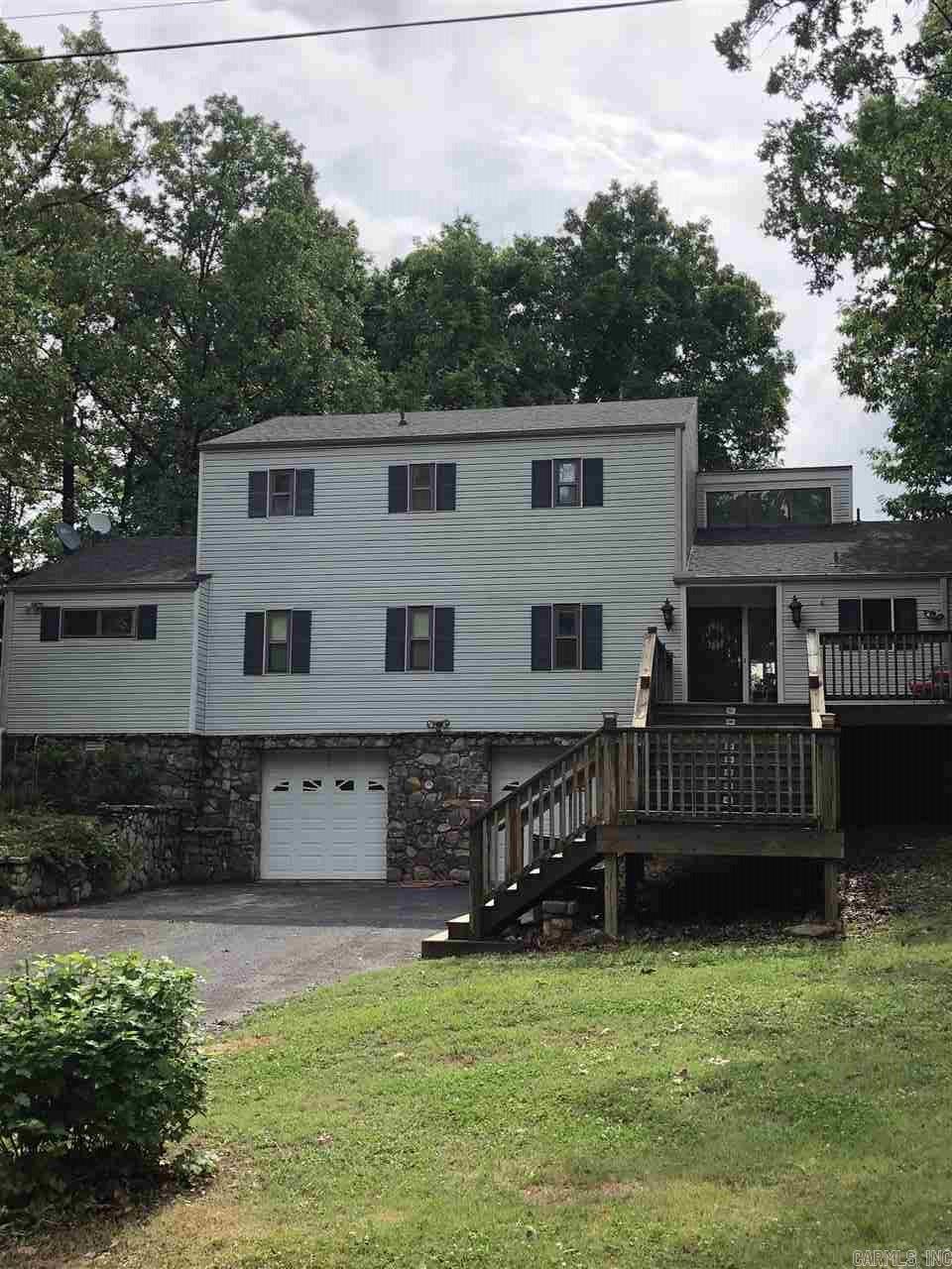 This house will not last long!! Owner has done numerous improvements, including new kitchen cabinets, sink, countertops, light fixtures, new recessed lighting in living and kitchen area, new vanities and sinks in all bathrooms, new flooring throughout, new subflooring on main floor except master bath, floor was leveled as much as possible, and new paint throughout! Lots of room for the price! See agent remarks!