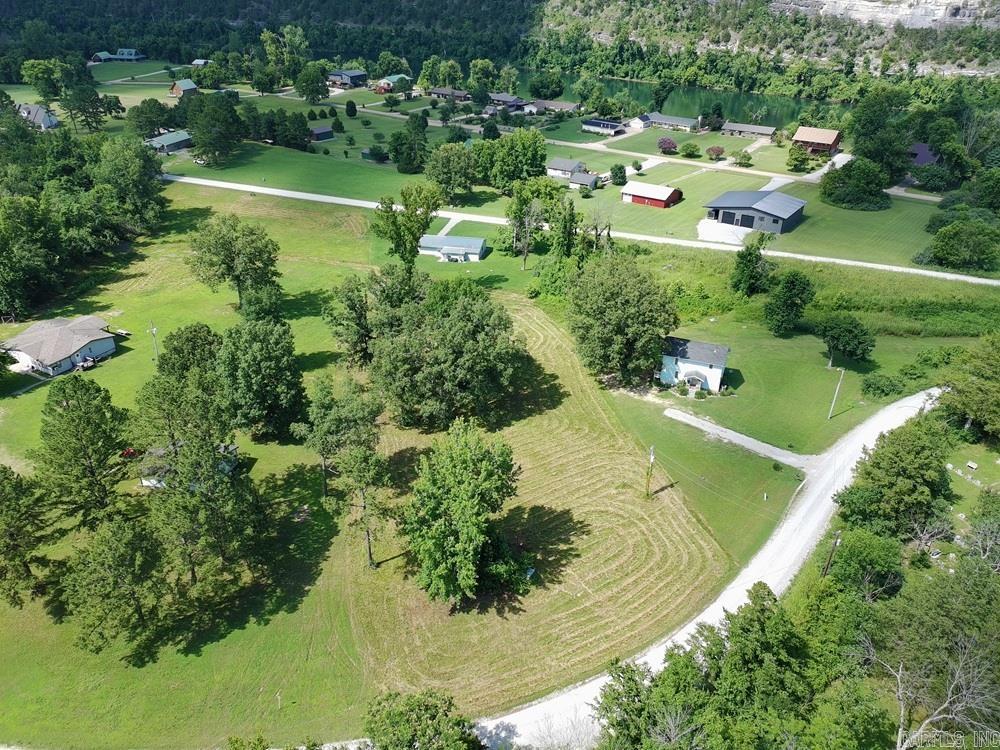 Discover your dream home in the White River Valley! This Fully Furnished turn key stunning 1,320 sq. ft. residence features three bedrooms and three baths, perfect for family living. The open floor plan that includes a wood burning stove, abundant natural light, creating a warm, welcoming atmosphere. Nestled on a 1.58 acres cleared lot that fronts both CR 101 & CR 102 behind the home, enjoy peace and privacy while being just an eighth of a mile from the White River Boat Ramp Launch. Embrace White River Valley living with White River adventures at your doorstep! Don’t miss this rare opportunity!