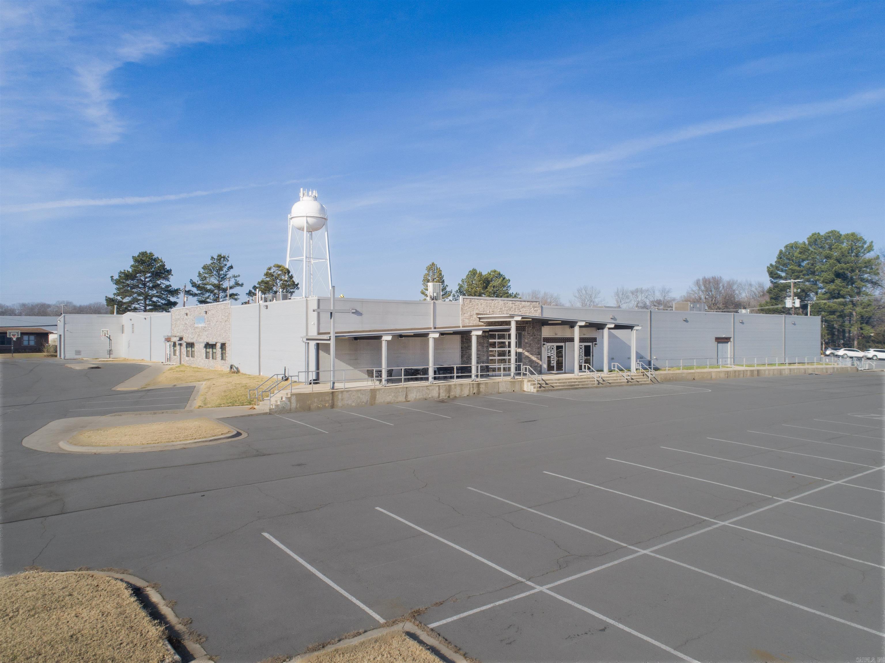 Exceptional Opportunity! 58,924 Sf Church & School on 5.07 acres. Updated sanctuary can seat up to 600 w/stage & elevated sound booth already in place. Modernized lobby w/inviting atmosphere & adaptable layout that links sanctuary, coffee shop, nursery & commercial grade kitchen together. Campus features multiple classrooms, offices, renovated restrooms in both church & school, plus 14,800 sf warehouse. This premium church property has been well maintained and significantly upgraded with installation of all new roof in 2025. Building is move in ready & equipped w/fire suppression, fire alarms & security system. MUCH CONVEYS!! All church equipment, furniture, & tech; including chairs, tables, sound system, stage lighting, TV’s, appliances & large walk-in freezer. Developed parking lot w/curb & gutter, with 235 paved parking spaces. Excellent access & visibility. 430’ frontage on So 2nd St. (10,000 VPD), 390’ on Richie Rd. Population of 6,844 within one mile radius, & 27,362 in three miles. Call for more details!