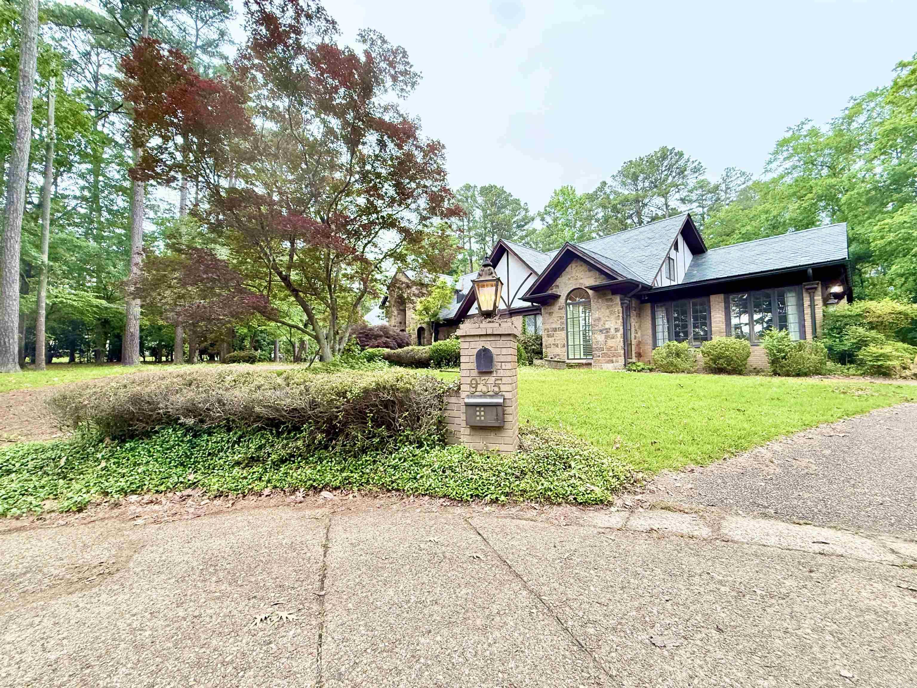 Step into timeless elegance with this custom-built, regal estate designed for both grand living and everyday comfort. A stunning double entrance drive welcomes you in, setting the tone for what’s inside. Built in 1975, this home is filled with character you can’t recreate—soaring ceilings, multiple fireplaces, and impressive double-sided fireplaces that anchor the main living spaces. The kitchen is spacious and ideal for entertaining or preparing large meals, complete with a pantry for added convenience. Enjoy a variety of living spaces including a sunroom, den, formal dining, and formal living room, each offering its own charm and function. The primary suite is tucked away in its own private wing, featuring a personal living area along with standout closets and a spacious bath. Upstairs offers a gorgeous office and two additional bedrooms, providing flexibility for work or guests. Built-in storage can be found throughout the home. Outside, a private tennis court adds the perfect touch to this two-story luxury property full of timeless appeal.