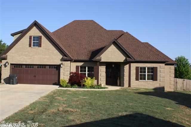 BEAUTIFULL ALL BRICK, ALL ELECTRIC CUSTOM BUILT HOME BY DEREK DANIELS IS LESS THAN A YEAR OLD.  FEATURING DARK TRIM & ACID STAINED FLOORS THROUGHOUT THE MAIN LEVEL AS WELL AS GRANITE & CUSTOM BLINDS THROUGHOUT THE MAIN LEVEL.  THE MASTER SUITE IS VERY LARGE W/WALK-IN TILE SHOWER & BIG WALK-IN CLOSET.  UPSTAIRSTHE FOURTH BEDROOM IS CURRENTLY USED AS A BONUS/MEDIA ROOM BUT HAS ITS OWN PRIVATE BATH AMD WALK-IN CLOSET.  A LARGE SUNROOM IS ON THE BACK OF THE HOUSE LOOKING OUT INTO THE LARGE PRIVACY FENCED BACKYR