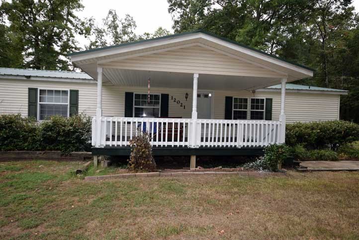 Nice 3 bedroom, 3 bath manufactured home with an attached garage and  an additional detached shop on 3 acres. Enjoy the country setting on the large front porch or beautiful gazebo. Custom designed with many extras. 6 inch walls make this home energy efficient.