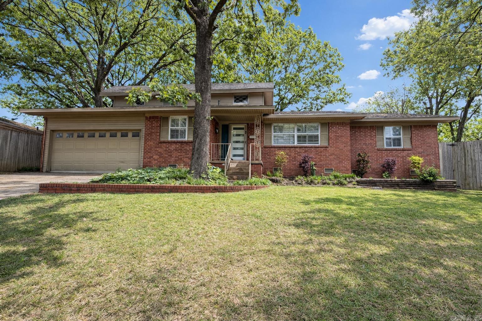 Beautifully remodeled home in the desirable Lakewood subdivision of North Little Rock! This spacious 3- bedroom, 3 bath property features a rare and highly sought after layout with two primary suites, perfect for multi-generational living or added privacy for guests. The home has been thoughtfully updated with modern finishes while maintaining its classic charm. Enjoy multiple living spaces, a functional floor plan, wet bar, and abundant natural light throughout.  Step outside to a large, tree shaded yard with mature landscaping, ideal for relaxing or entertaining. The property also includes a new roof, and HVAC providing peace of mind for years to come.  Conveniently located near parks, shopping, dining, and all that Lakewood has to offer, this move-in-ready home is a must-see!
