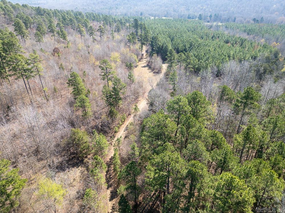 If you’re looking for a property just in time for turkey season, this 192± acre tract on Union Hill Road in Pleasant Plains, Arkansas offers a great opportunity in Independence County. Accessed by a gated easement, the property provides privacy along with an extensive trail system for easy navigation. The land features mature pine timber that was select harvested approximately 15 years ago, along with strong hardwood regrowth creating excellent wildlife habitat. Several open pockets offer ideal locations for food plots, and the property supports abundant deer and turkey activity. Situated above Departee Creek, the property also features seasonal streams that run during wetter months. With approximately 320 feet of elevation change, the terrain is steep and rugged, highlighted by rock outcroppings and bluff features. Conveniently located 30 minutes from Batesville, 25 minutes from Bald Knob, and under an hour from Heber Springs. No utilities on site. Mineral rights do not convey.