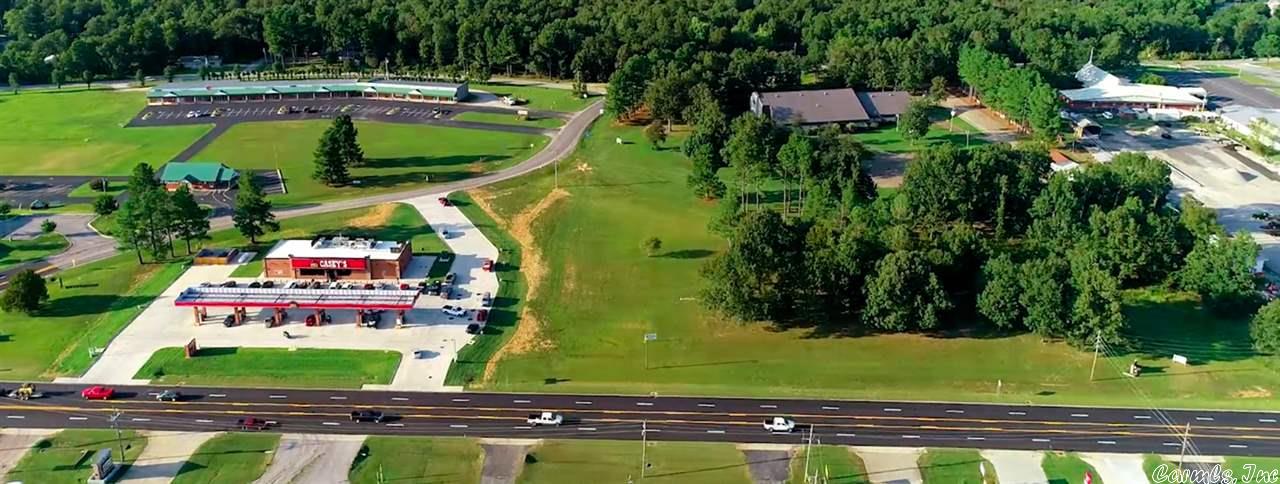 1.16 Acres Undeveloped Land Fronts US Hwy 62/412 - One of the highest traffic intersections in Sharp County, Arkansas & the center of four neighboring cities. 15 Mile radius total population is 20,693. 10,000+ daily US Hwy 62-412 traffic count & 3,400 daily AR Hwy 175 traffic count. Water, sewer, 3-Phase power, internet & phone available on site. Zoned Commercial (CP-2). Flat terrain & excellent building conditions. 400 Yards from Highland Public Schools. Owner will subdivide or sell as a single large tract. Detailed information sheet of all three lots available and the area is attached as a printable PDF.
