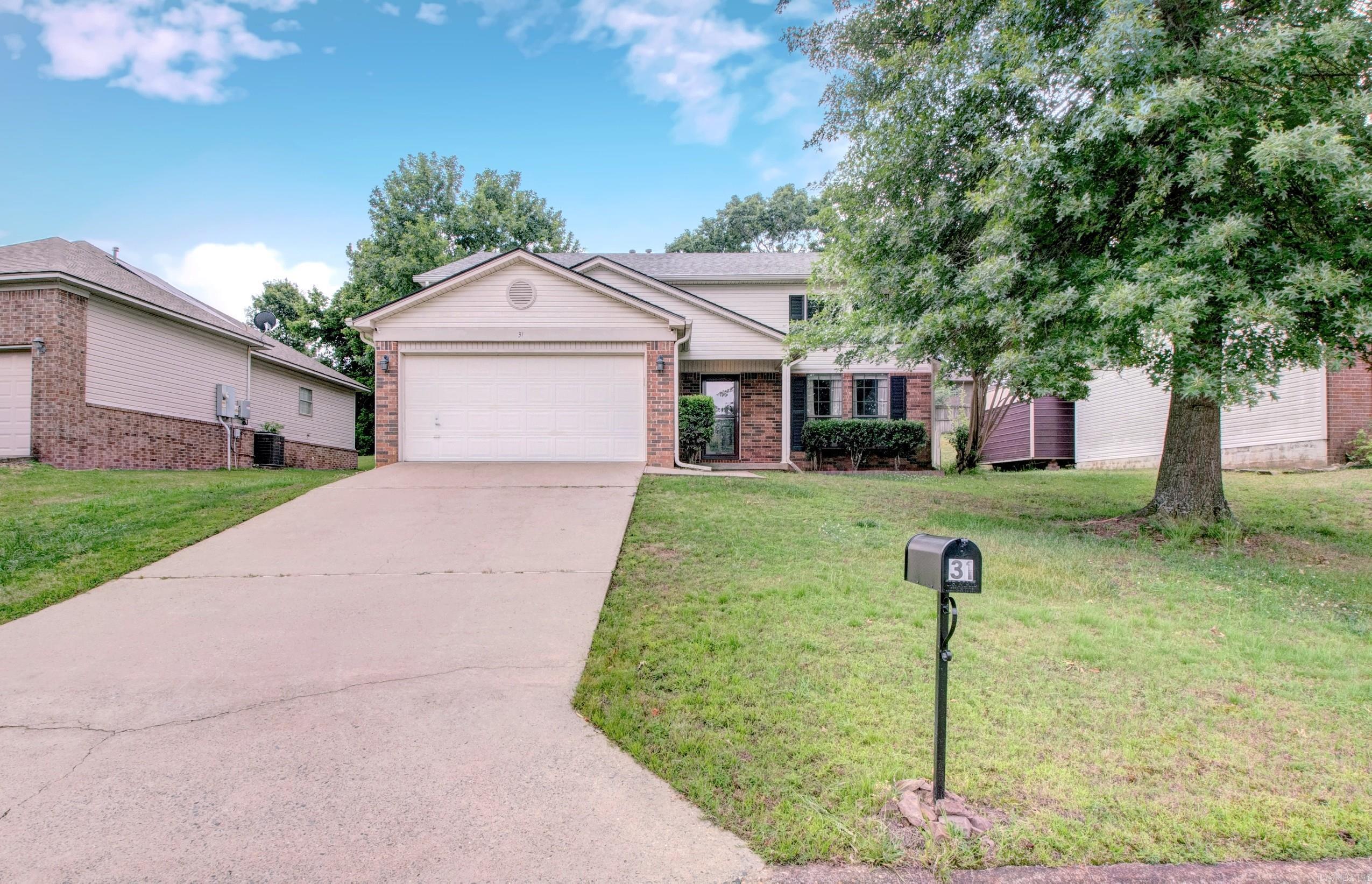 Welcome to this beautiful home in Maumelle.  On the main level you will find the family room, dining room, kitchen, 1/2 bath and a spacious primary suite.  The primary bath features 2 sinks, a walk-in shower, soaking tub and a nice closet.  Step outside to enjoy the beautiful backyard with flagstone patio, sunshade, and apple trees- a wonderful space for relaxing or entertaining.  Upstairs offers a spacious bonus area, 2 additional bedroom, a full bath, and floored attic space for extra storage.   Roof-2024, HVAC and Hot water heater updated around 2018. Come this the home today.  Agents see remarks.