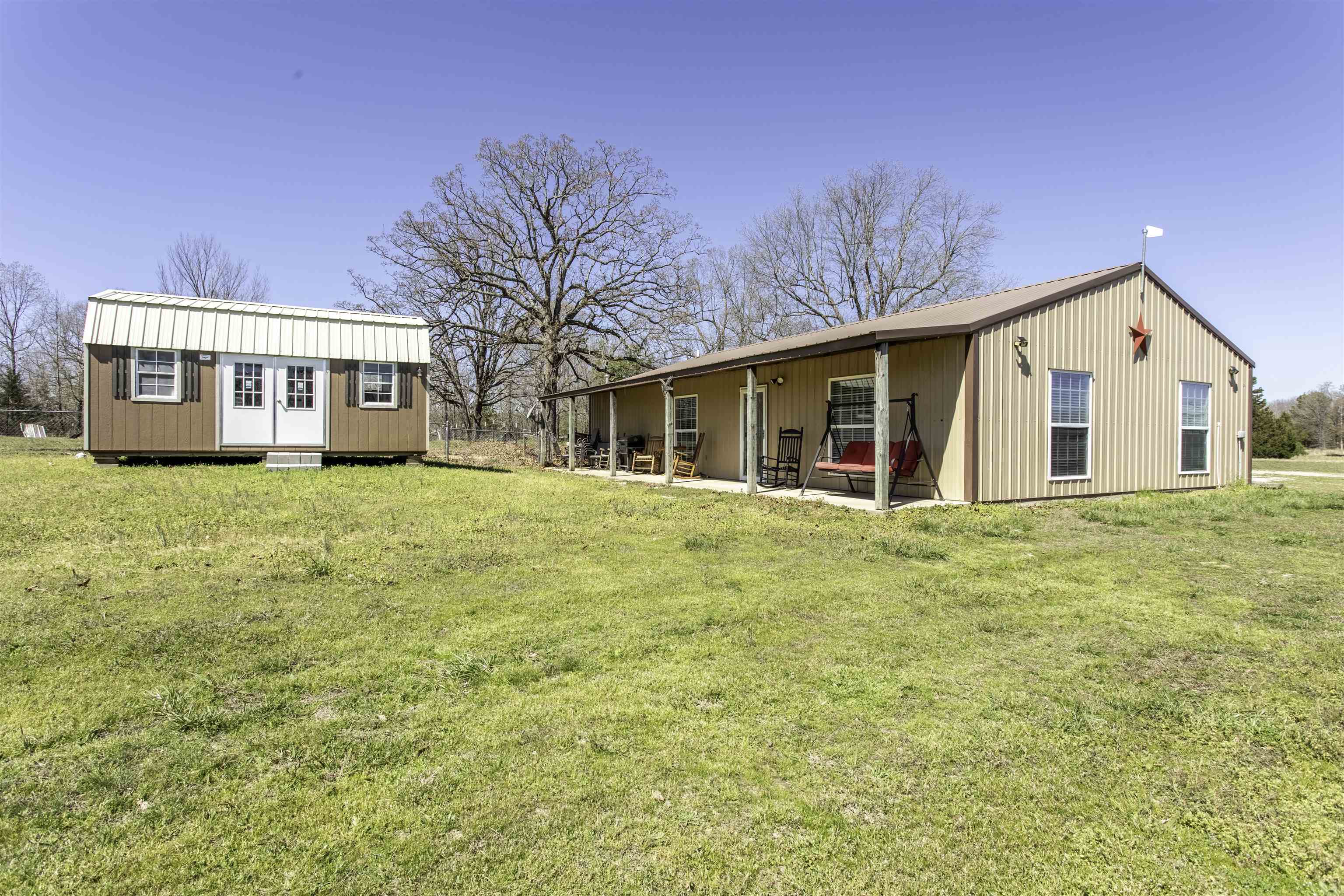 Recently renovated barndominium offering approx. 1,500 sq ft on a peaceful ±2-acre setting. This 3-bedroom, 2-bath home features an open-concept kitchen and living room that creates a bright, functional central space for everyday living and entertaining.  Central HVAC provides year-round comfort, and the home’s updated layout makes it efficient, low-maintenance, and move-in ready.  Enjoy the outdoors from the covered back patio—perfect for morning coffee, evening unwinding, or hosting friends while taking in the quiet country setting.  A solid fit for a primary residence, weekend getaway, or investment property with room to breathe and space to enjoy.  **Additional Opportunity:** Adjoining properties may also be purchased to expand your investment, homestead, or development footprint. These properties are available separately and are not included in the current listing price.