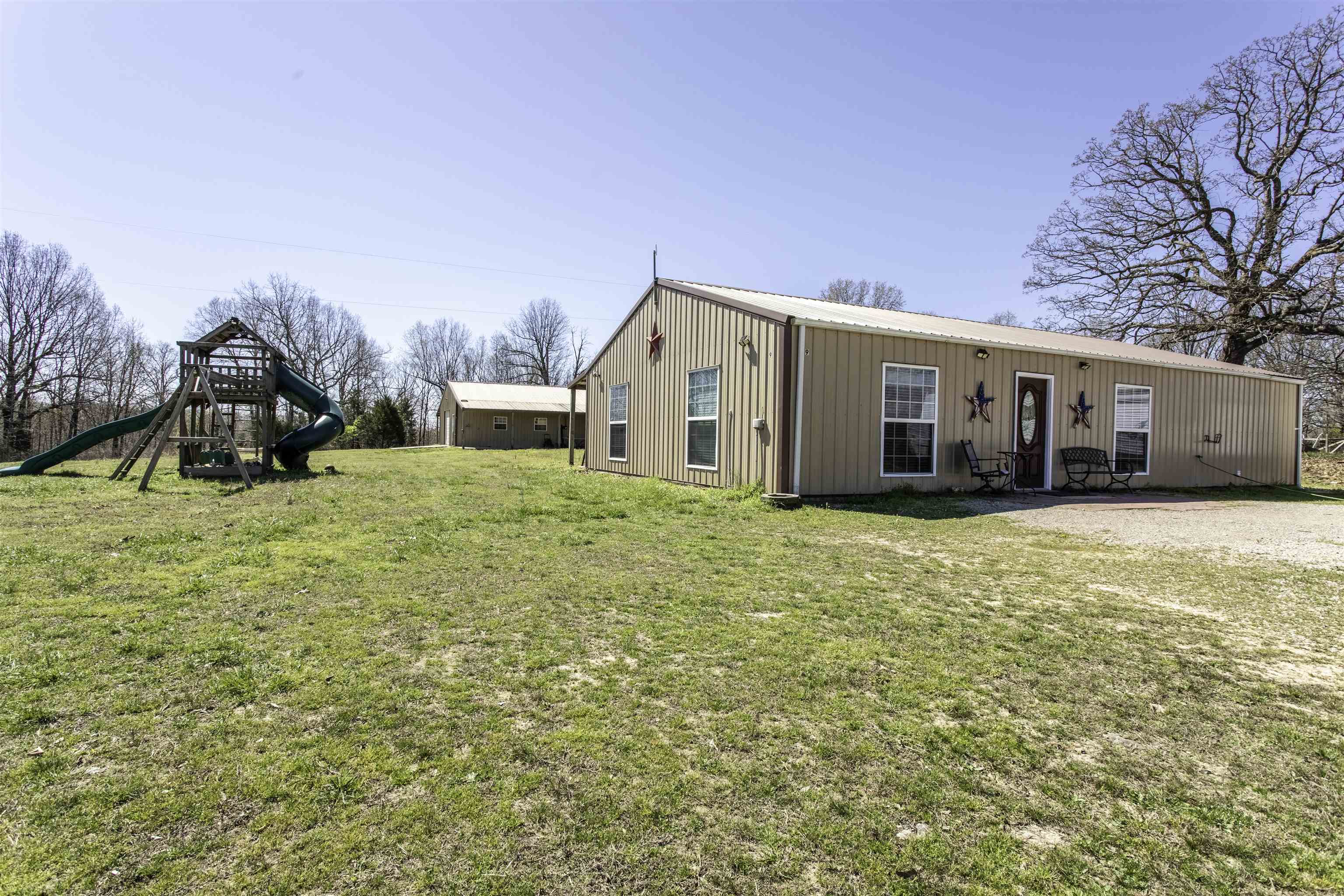 Recently renovated barndominium offering approx. 1,500 sq ft on a peaceful ±2-acre setting. This 3-bedroom, 2-bath home features an open-concept kitchen and living room that creates a bright, functional central space for everyday living and entertaining.  Central HVAC provides year-round comfort, and the home’s updated layout makes it efficient, low-maintenance, and move-in ready.  Enjoy the outdoors from the covered back patio—perfect for morning coffee, evening unwinding, or hosting friends while taking in the quiet country setting.  A solid fit for a primary residence, weekend getaway, or investment property with room to breathe and space to enjoy.  **Additional Opportunity:** Adjoining properties may also be purchased to expand your investment, homestead, or development footprint. These properties are available separately and are not included in the current listing price.