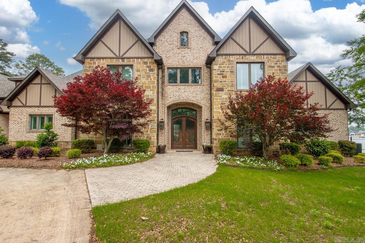 Luxury living at its finest in this exceptional custom-built estate. Featuring 6 bedrooms, each with a private ensuite, plus a theater/game room and upstairs bonus with surround sound throughout. Showcasing an impressive 5-car garage and 2 laundry rooms-one upstairs and one downstairs for added convenience. The primary suite is a true retreat with patio access, sitting area, and dual closets, hers with built-ins and a shoe closet, his doubling as a storm shelter for added peace of mind. The chef’s kitchen is equipped with Wolf appliances, Sub-Zero refrigerator/freezer, built-in Miele espresso maker. Custom lighting,including the chandelier, wall fixture, and island pendants, was thoughtfully designed and installed by James Hayes, adding a unique and elevated touch.  Unwind on the covered patio overlooking the sparkling pool and serene lake, all set on 3.23 acres in Hurricane Lake Estates. Sprinkler/irrigation system on 2 acres. Pre-approval letter or proof of funds required prior to showing.  *AGENTS SEE REMARKS*