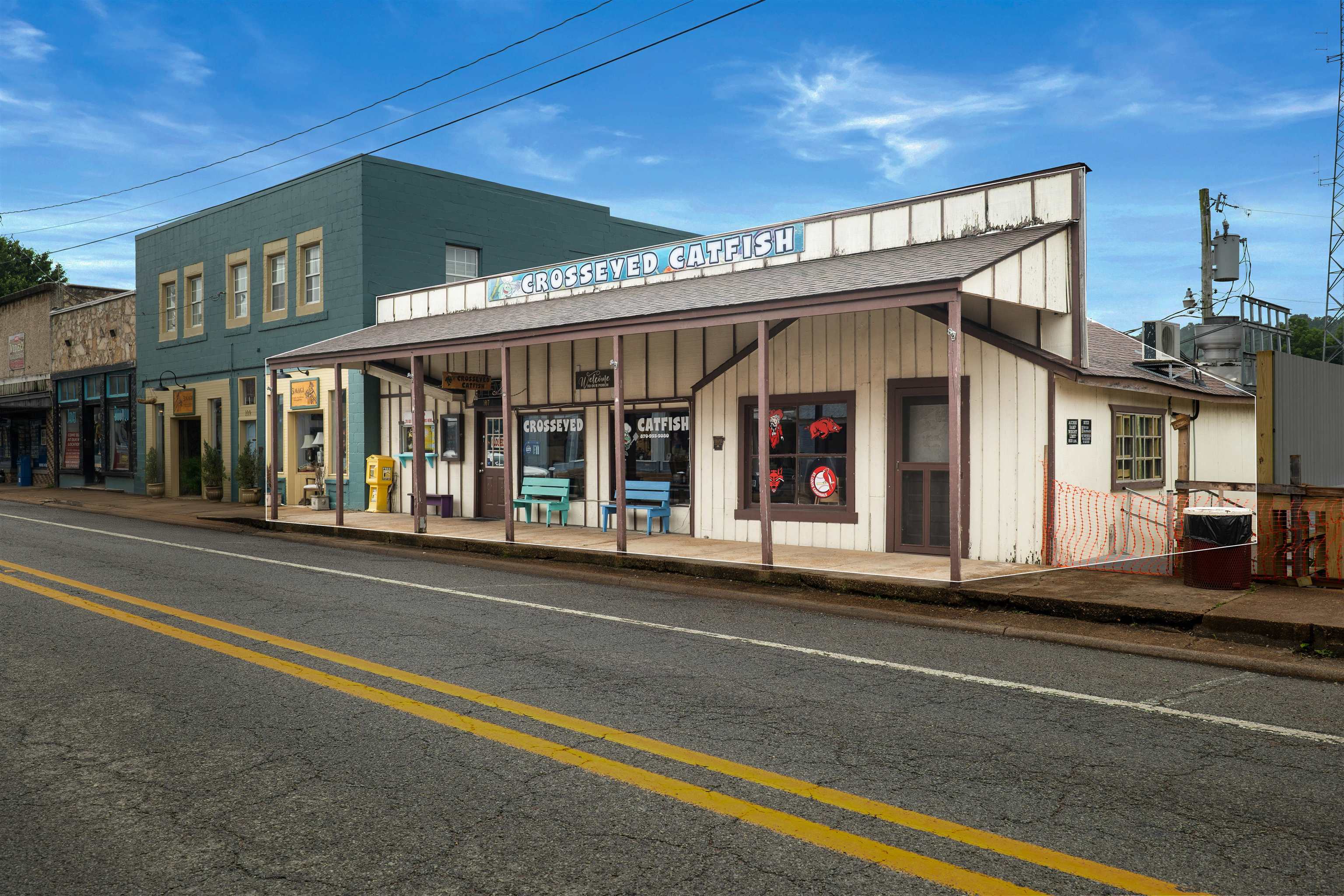 The CrossEyed Catfish on historic Main Street in Hardy is now available as a true turn-key business opportunity, positioned on one of the busiest corridors in the region with the latest ARDOT traffic report showing 5,000 to 7,800 vehicles passing daily. This well-established restaurant offers dining room seating for 50 and comes fully equipped with a complete commercial kitchen, including 5 freezers, 2 refrigerators, 5 fryers, a griddle, full range, new vent hood and fire suppression system, prep and cooling station, new HVAC, exterior grease trap, and more. The location is exceptional—surrounded by other established businesses and directly beside the new Hardy Pocket Park now under construction—making this a rare chance to own a proven business in a high-visibility, high-traffic, historic district-an opportunity that continues to grow in value as Main Street evolves.