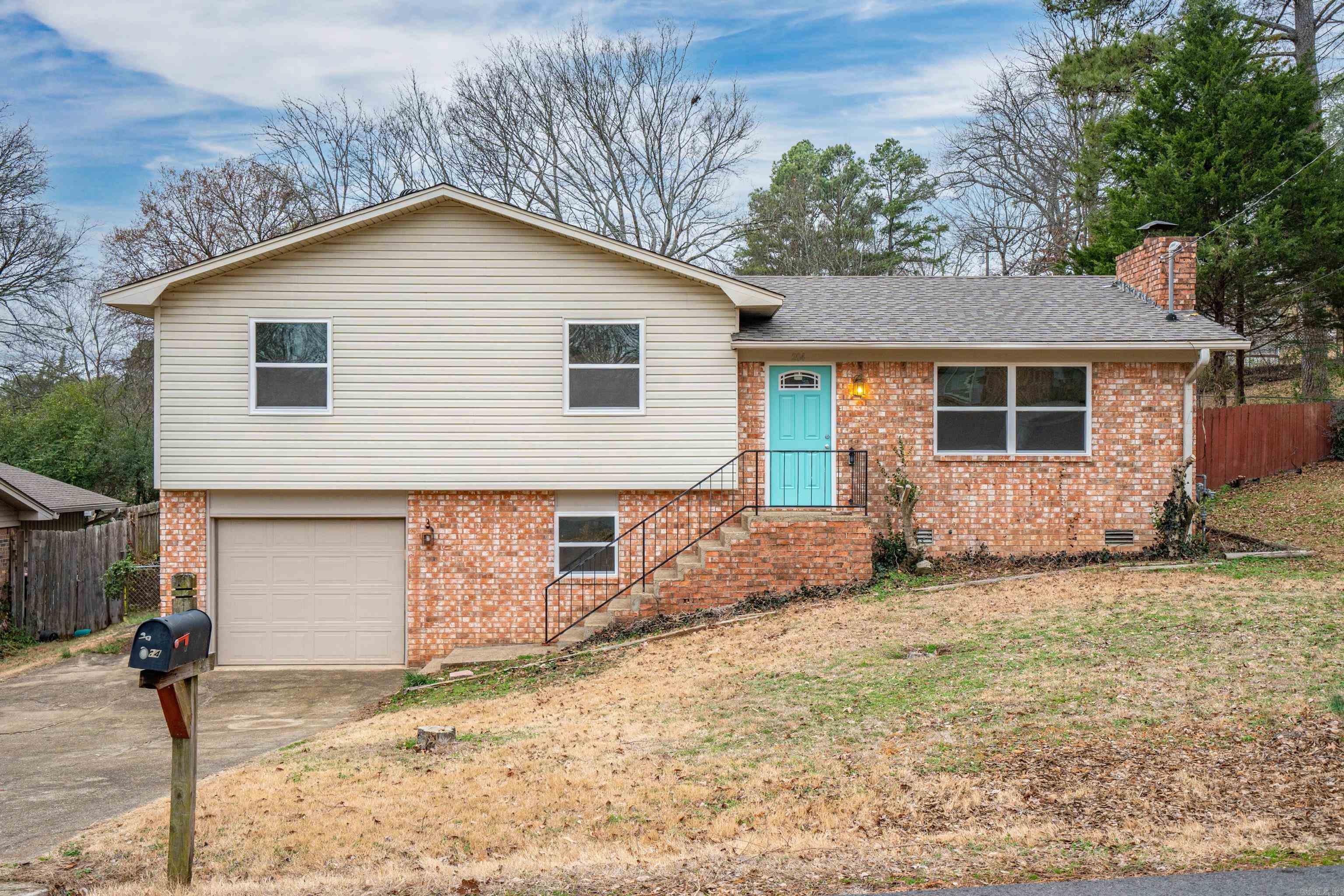 This beautifully remodeled 3-bedroom, 2-bath home offers modern updates throughout, including brand-new flooring, fresh walls, an upgraded kitchen, a new roof, and energy-efficient windows. The spacious multipurpose bonus room downstairs could easily serve as a 4th bedroom or additional living space to suit your needs. Key updates also include new kitchen plumbing and electrical improvements, adding significant value to this home. Enjoy the outdoors on the newly renovated deck overlooking the backyard. Conveniently located near shopping, medical offices, dining, and Oaklawn, this home combines comfort, functionality, and prime location.