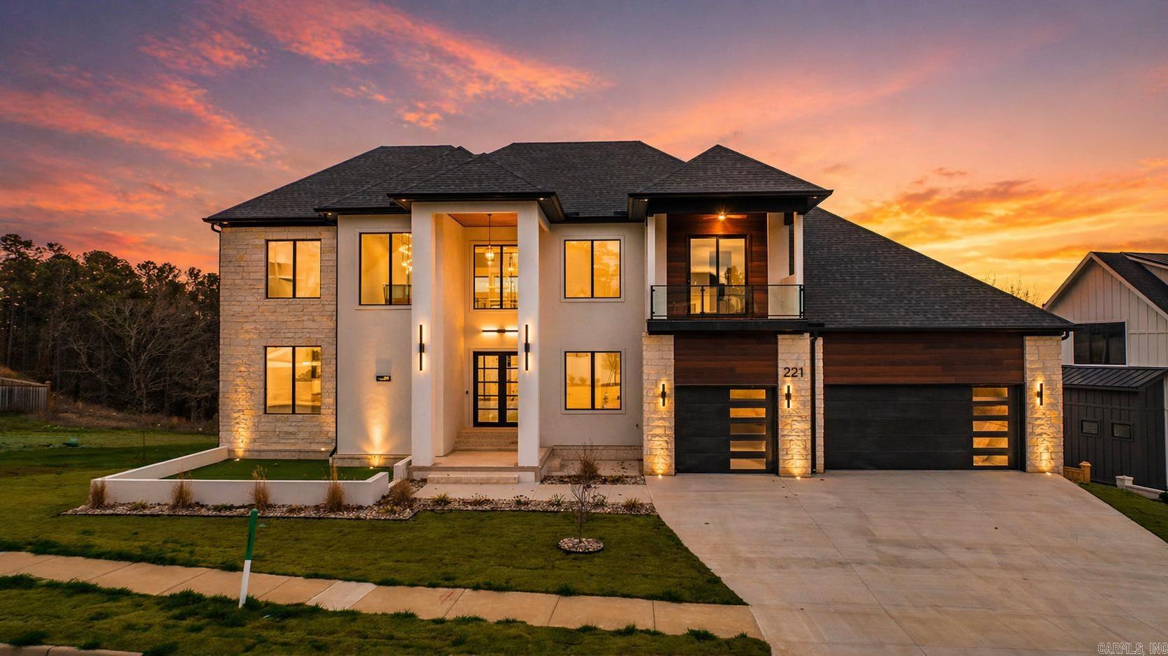 Stunning new construction in the Falstone subdivision of Chenal Valley! This impressive 3-level home with a walkout basement offers exceptional design and energy efficiency. The main living area features soaring two-story ceilings and oversized Pella Lifestyle Series windows, including large picture windows and quad sliding doors that flood the home with natural light. The chef’s kitchen includes GE Café appliances, ceiling-height cabinetry, and a butler’s pantry with beverage cooler.  Built for efficiency and comfort with spray-foam encapsulated attic insulation, high-efficiency Trane variable-speed HVAC systems (18 SEER, 95%+ AFUE furnaces), and a tankless water heater. The home includes 5 full baths and 1 half bath, with custom tiled showers and tiled tub surrounds.  Enjoy incredible entertaining spaces including a finished main-level balcony, outdoor kitchen, and a huge covered and open patio from the walkout basement featuring a wet bar with beverage cooler. The property offers a two-level front porch, glass railings, LED stair lighting, wired security, large front and side yards, and a private greenbelt backdrop for added privacy.  *Some photos have been virtually staged*