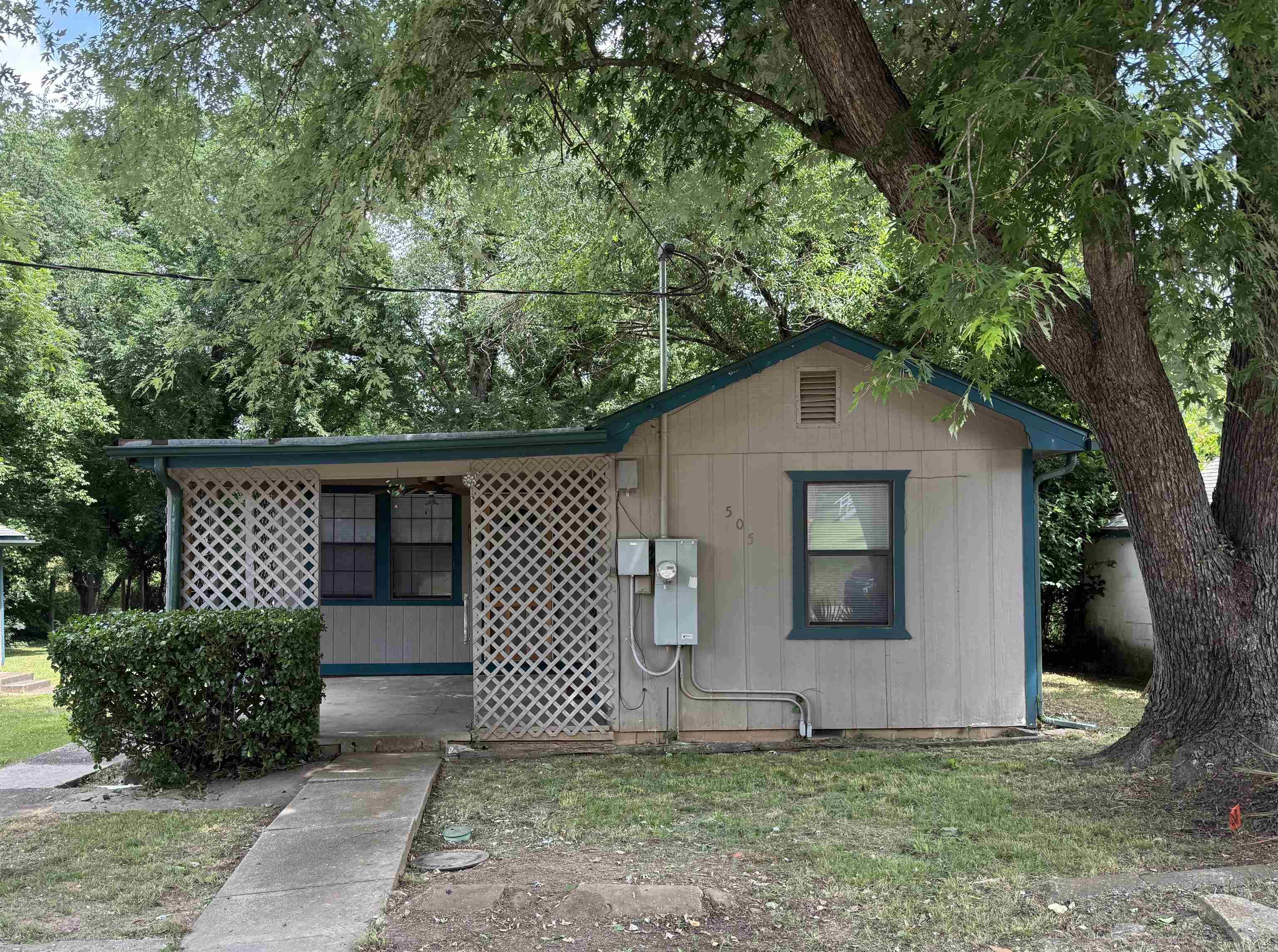 Excellent opportunity for an investor or first-time home buyer! This charming 2-bedroom, 1-bath home features a partial basement, a covered front porch, and a huge detached 2-car garage with an attached carport. Plenty of space for storage, parking, or a workshop, all while offering cozy charm and great potential!