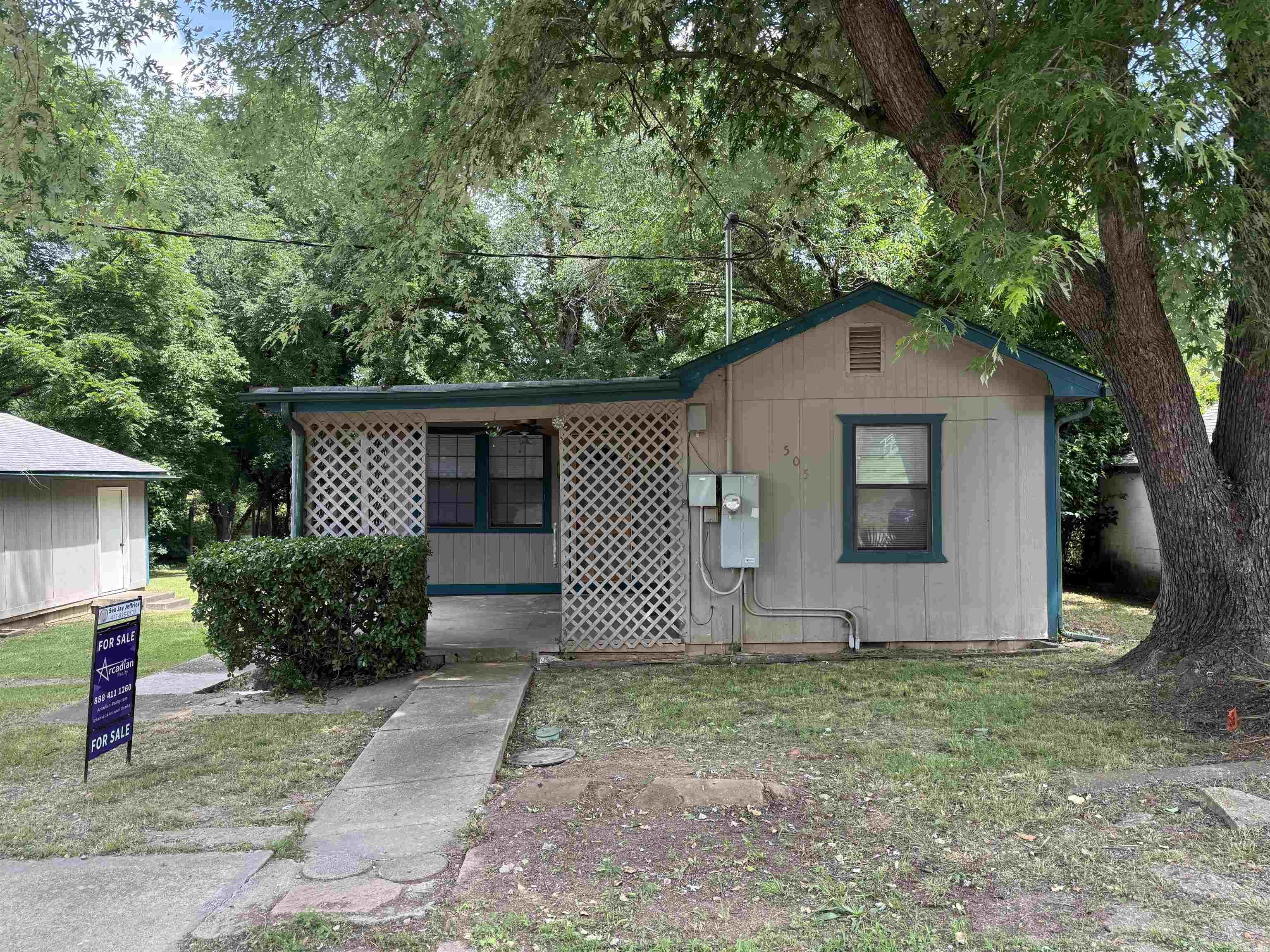 Excellent opportunity for an investor or first-time home buyer! This charming 2-bedroom, 1-bath home features a partial basement, a covered front porch, and a huge detached 2-car garage with an attached carport. Plenty of space for storage, parking, or a workshop, all while offering cozy charm and great potential!