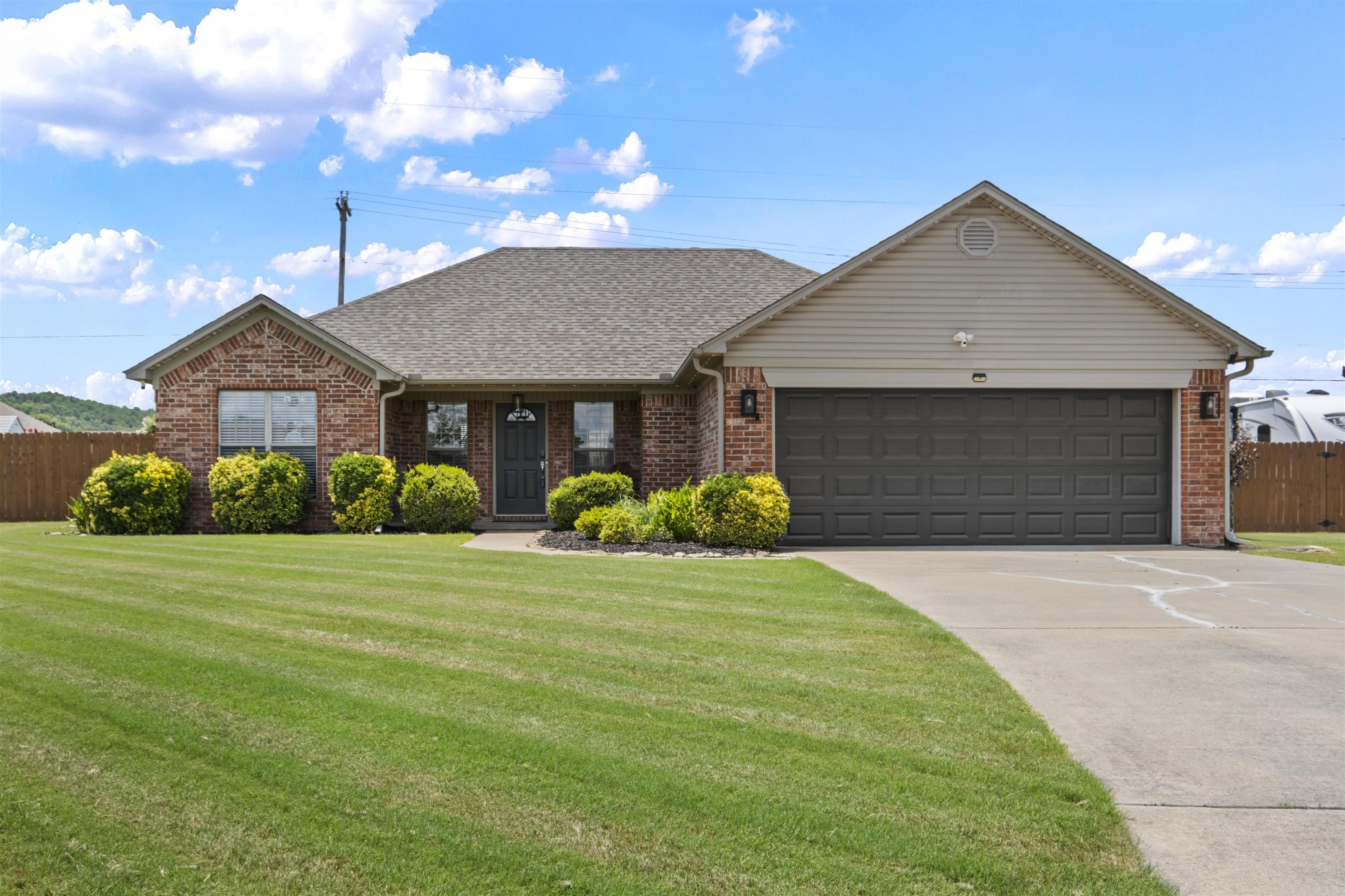 Beautifully updated all-brick 3-bedroom, 2-bath home nestled on a generous .65-acre lot in the heart of Conway! This move-in-ready home blends comfort, style, and space with new LVP flooring throughout, meaning absolutely no carpet to worry about. The open-concept layout is highlighted by custom beams, a spacious living area, updated lighting, and a cozy gas fireplace. The chef’s kitchen shines with granite countertops and new stainless steel appliances, creating the perfect setting for everyday meals or entertaining guests.  The private primary suite offers a relaxing retreat with its own ensuite bath and jacuzzi jetted tub, while two additional bedrooms and a full bath are thoughtfully located on the opposite side of the home. Modern updates extend throughout, including a 2022 roof, 2022 HVAC system, hot water heater, and garage door opener.  Outside, enjoy your own backyard oasis with a large fenced yard, new 27-foot above-ground pool, with custom built deck, a new 8x10 shed, 50-amp RV hookup, and gravel pad for an RV, boat, or extra parking. A rare Conway find with room to spread out, thoughtfully updated and ready for you to call home!