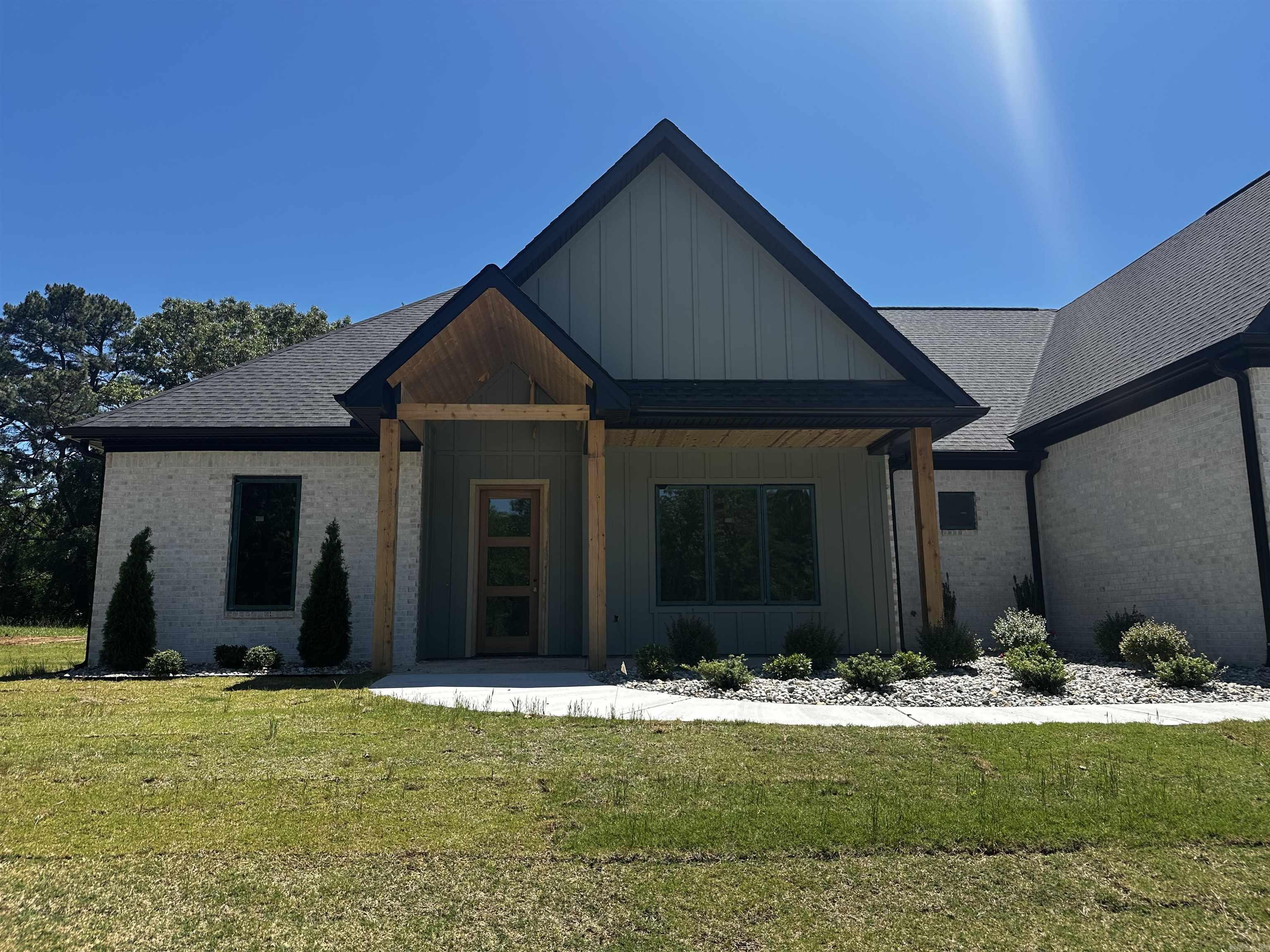 Experience the perfect blend of space, style, and functionality in this stunning new construction home situated on a full acre lot. Offering 4 bedrooms, 3.5 bathrooms, and a thoughtfully designed layout, this home is ideal for everyday living and entertaining alike.  The heart of the home features a spacious kitchen with quartz countertops, gas appliances, and a large walk-in pantry ready to keep everything organized. Just off the entry, you'll find a dedicated office space—perfect for working from home or creating a quiet retreat.  The private primary suite is generously sized and designed for comfort, complete with a luxurious bath featuring split vanities, a dedicated makeup counter, soaking tub, pass-through shower, and an oversized walk-in closet that conveniently connects to the laundry room. Two additional bedrooms and a full bath are located downstairs, while the upstairs bonus room with its own bath can easily serve as a 4th bedroom, guest suite, or flex space.  Set on a beautiful one-acre homesite, this property offers room to breathe while still delivering modern finishes and timeless design. Estimated completion is the end of June—secure it now and make it yours!