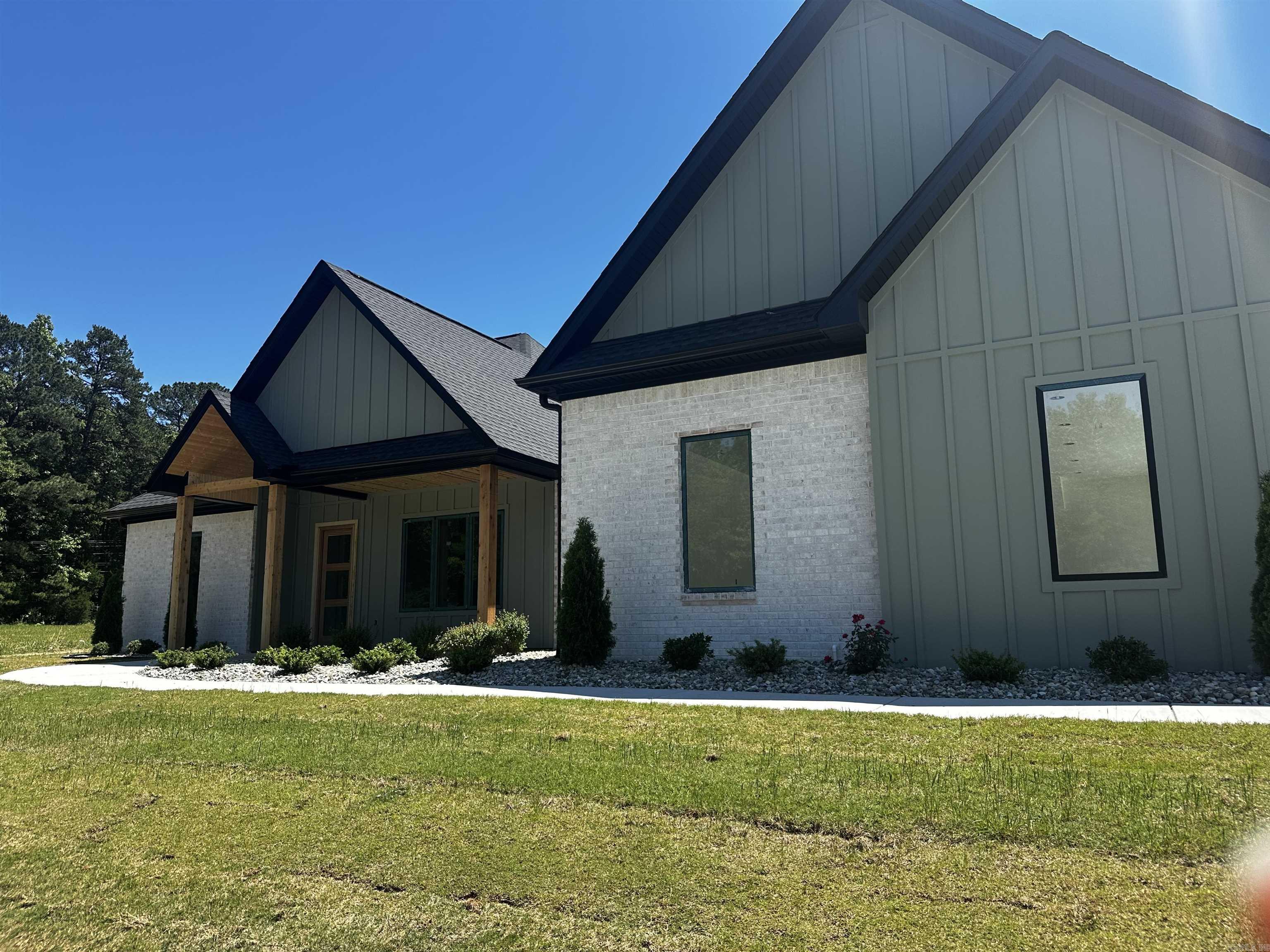 Experience the perfect blend of space, style, and functionality in this stunning new construction home situated on a full acre lot. Offering 4 bedrooms, 3.5 bathrooms, and a thoughtfully designed layout, this home is ideal for everyday living and entertaining alike.  The heart of the home features a spacious kitchen with quartz countertops, gas appliances, and a large walk-in pantry ready to keep everything organized. Just off the entry, you'll find a dedicated office space—perfect for working from home or creating a quiet retreat.  The private primary suite is generously sized and designed for comfort, complete with a luxurious bath featuring split vanities, a dedicated makeup counter, soaking tub, pass-through shower, and an oversized walk-in closet that conveniently connects to the laundry room. Two additional bedrooms and a full bath are located downstairs, while the upstairs bonus room with its own bath can easily serve as a 4th bedroom, guest suite, or flex space.  Set on a beautiful one-acre homesite, this property offers room to breathe while still delivering modern finishes and timeless design. Estimated completion is the end of June—secure it now and make it yours!