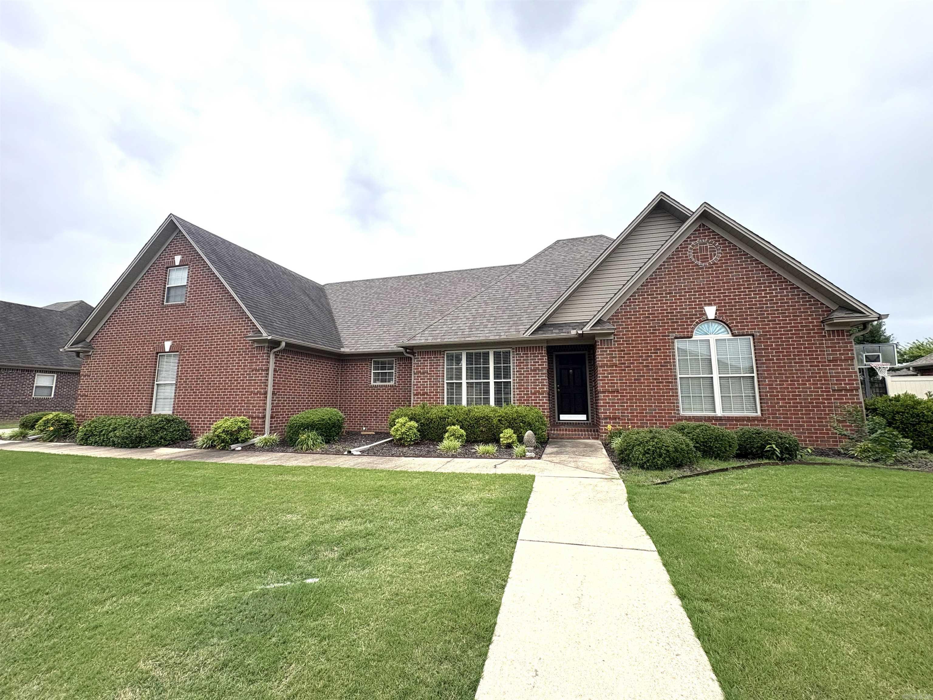 Immaculately maintained property with fenced yard and shop in the heart of Colony West subdivision on Searcy's west side. Custom brick home designed and owned by a builder, it has changed hands only once in 20 years. Spacious floorplan includes formal living room, casual living room, breakfast room, and three bedrooms on the ground floor. Upstairs is a bonus room or bedroom with bathroom. Upgrades include Corian countertops, Bosch dishwasher, instant hot water in kitchen and bath, floored attic. The main bathroom has widened doors for wheelchair access. Exterior features include fenced, shaded back yard, two-car garage with wide driveway that can park four or more cars, detached workshop with electricity and roll-up door. Both the HVAC and roof are less than 10 years old.