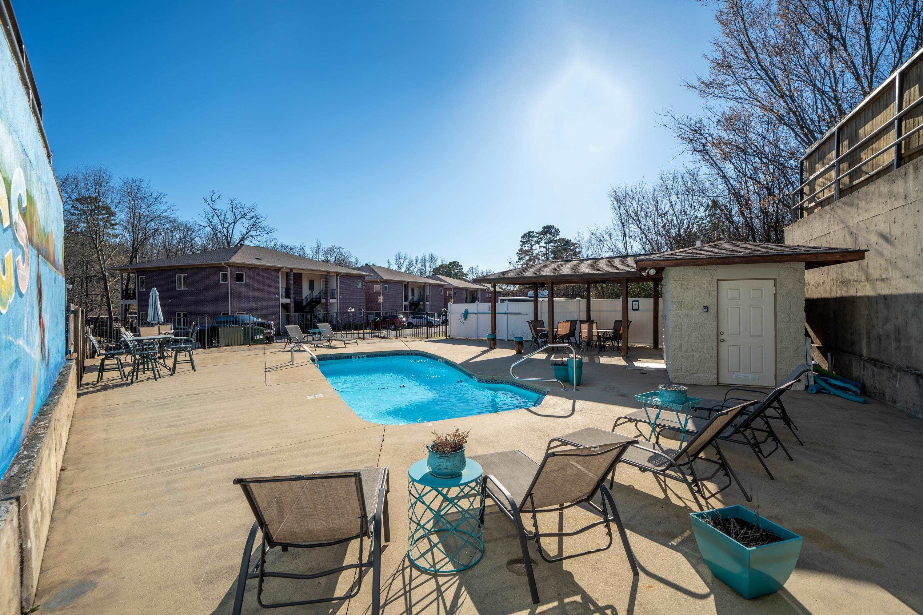 This lake Hamilton lakefront condo has it all! This unit features 2 bedrooms 2 baths with an open floor plan. The kitchen has granite counter tops with a tile backsplash. It is open to the living area which goes out on to the covered patio overlooking the lake. There is also a covered boat slip with a lift, a boat ramp, and boat trailer parking. The pool area has plenty of room for family and friends. The refrigerator, washer, and dryer convey.