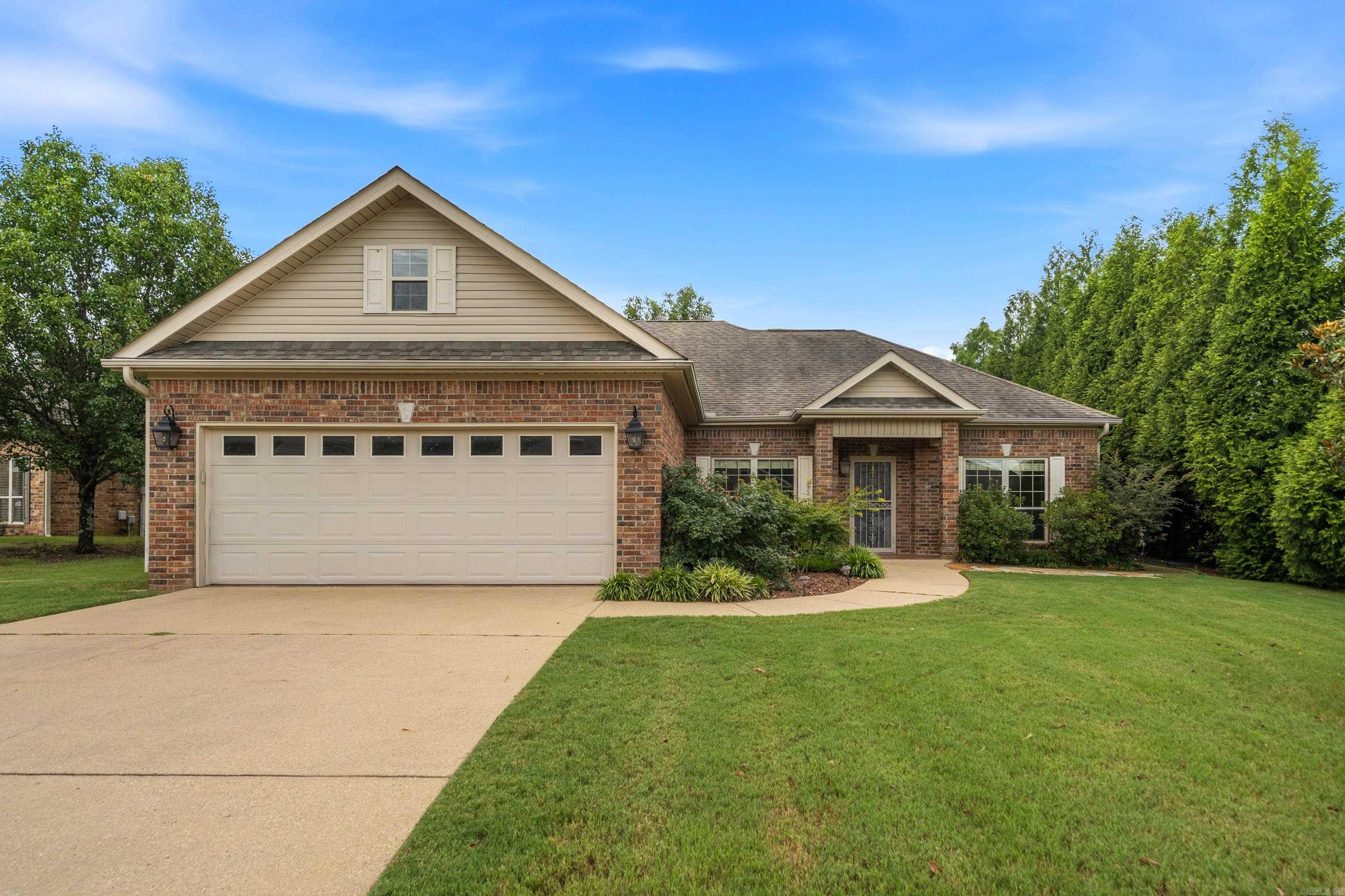 Welcome to easy living in the highly desirable Forest Lakes community! This beautifully maintained, single-story brick home offers 3 spacious bedrooms, 2 full baths, and a thoughtfully designed floor plan that's perfect for comfortable everyday living. Filled with natural light, the charming breakfast nook is the perfect place to enjoy your morning coffee while overlooking the peaceful backyard.  The spacious primary suite provides a relaxing retreat with a spa-like ensuite featuring both a walk-in shower and a soaking tub. Step outside to discover a stunning backyard offering plenty of space to garden, entertain family and friends, or simply unwind while enjoying the beauty of nature.  Located in one of Hot Springs' premier 55+ communities, Forest Lakes offers an exceptional lifestyle with outstanding amenities including a vibrant clubhouse, sparkling swimming pool, fitness center, billiards room, virtual golf, and a full calendar of community activities. Whether you're looking to stay active, meet new neighbors, or simply enjoy low-maintenance living, this neighborhood has it all.  Huge finished bonus room for extra storage or flex space.