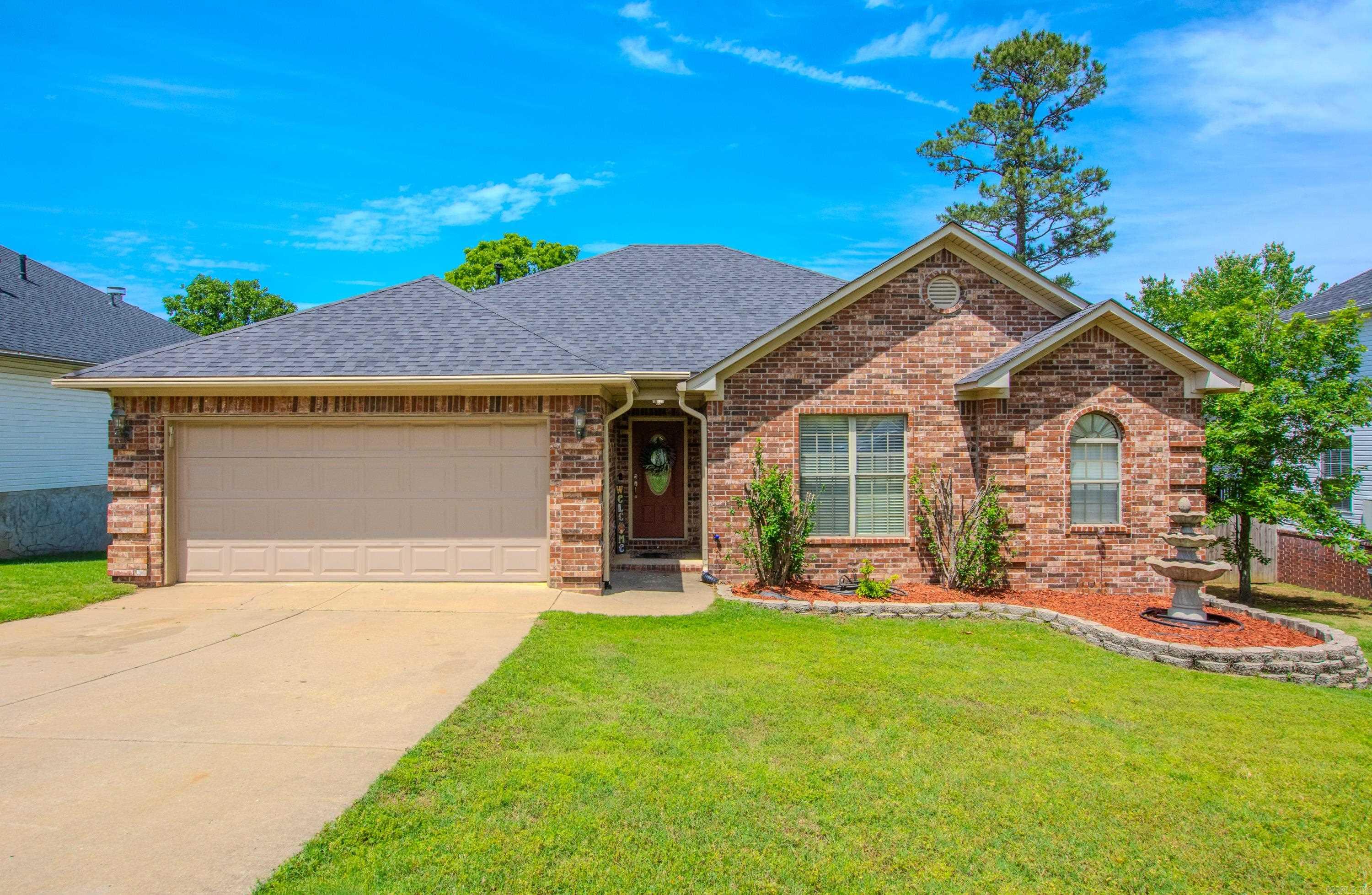 Yes, this IS the one. The one you’ve been waiting for.  Offering an inviting open flow floorplan, big kitchen with a dining area full of windows, a breakfast bar, lots of cabinets and countertop space, and a pantry.  The refrigerator will also stay. Large living room can easily accommodate full size furnishings. Updates include dishwasher, laminate flooring in the living room and hallway, carpet in bedrooms. Split bedroom plan with a large primary bedroom and primary closet. Dual sink vanity, jetted tub, and shower in the primary bathroom. New water tank in April 2026, Architectural shingle roof and Leaf Guard gutters in 2024. Nice deck out back with storage underneath, fully privacy fenced backyard, French drain system, and a level backyard. Located only minutes away from the Maumelle Community Center, swimming, Splash Pad, basketball, pickleball, skate park, tennis courts, and much more.
