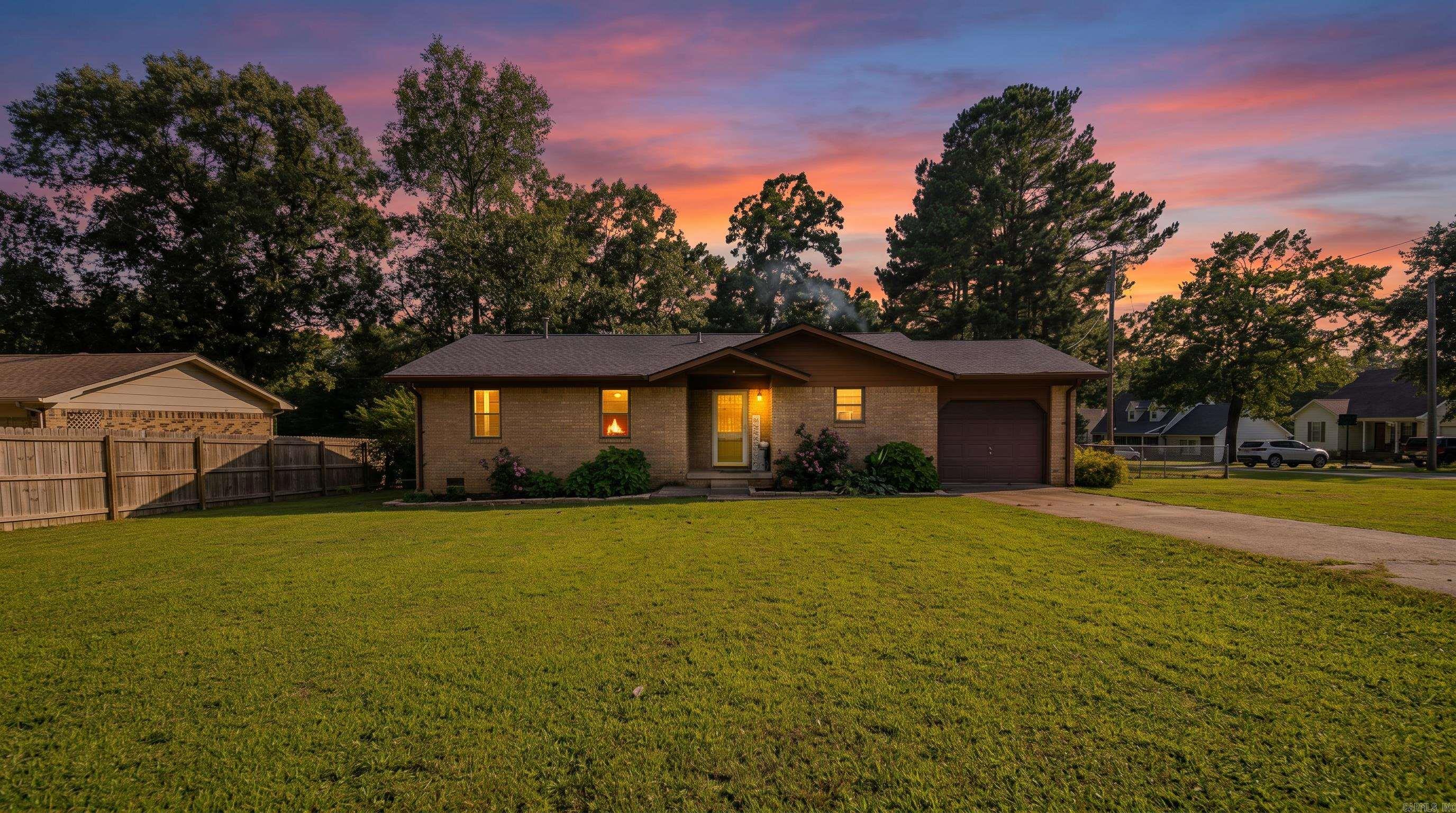 Move in Ready Home & Shop in Northern Arkansas  Move right into this beautifully updated brick home offering 1,199 square feet of comfortable living space on a spacious 0.46± acre corner lot. This 3-bedroom, 1.5-bath home was remodeled in 2022 and combines modern updates with everyday functionality. Inside, you'll find a blend of carpet, laminate, and engineered hardwood flooring, generously sized closets, and a full bath with a tub/shower combination.   Step outside to enjoy the large back deck, built just one year ago, that's perfect for entertaining, grilling, or relaxing. Additional features include a one-car attached garage, a roof that's only one year old, and an 18x27 shop with plenty of space for storage, projects, or hobbies. With its low-maintenance brick exterior, recent updates, and desirable corner lot, this move-in ready property offers the perfect blend of comfort, convenience, and value.