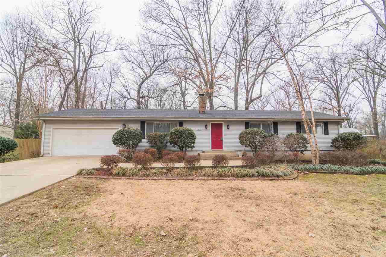 Charming home on just under a full acre lot w/great curb appeal. Family room sits right off entrance & has brick fireplace. Eat-in kitchen offers tile floors, granite counters, tile backsplash, breakfast bar, stainless appliances & abundant cabinetry. Master bedroom has plenty of space for unwinding at the end of the day & has private bath. Other amenities include a second living room, patio, privacy fenced backyard, shop with electricity, and two car garage that has recently had the floor painted w/epoxy.